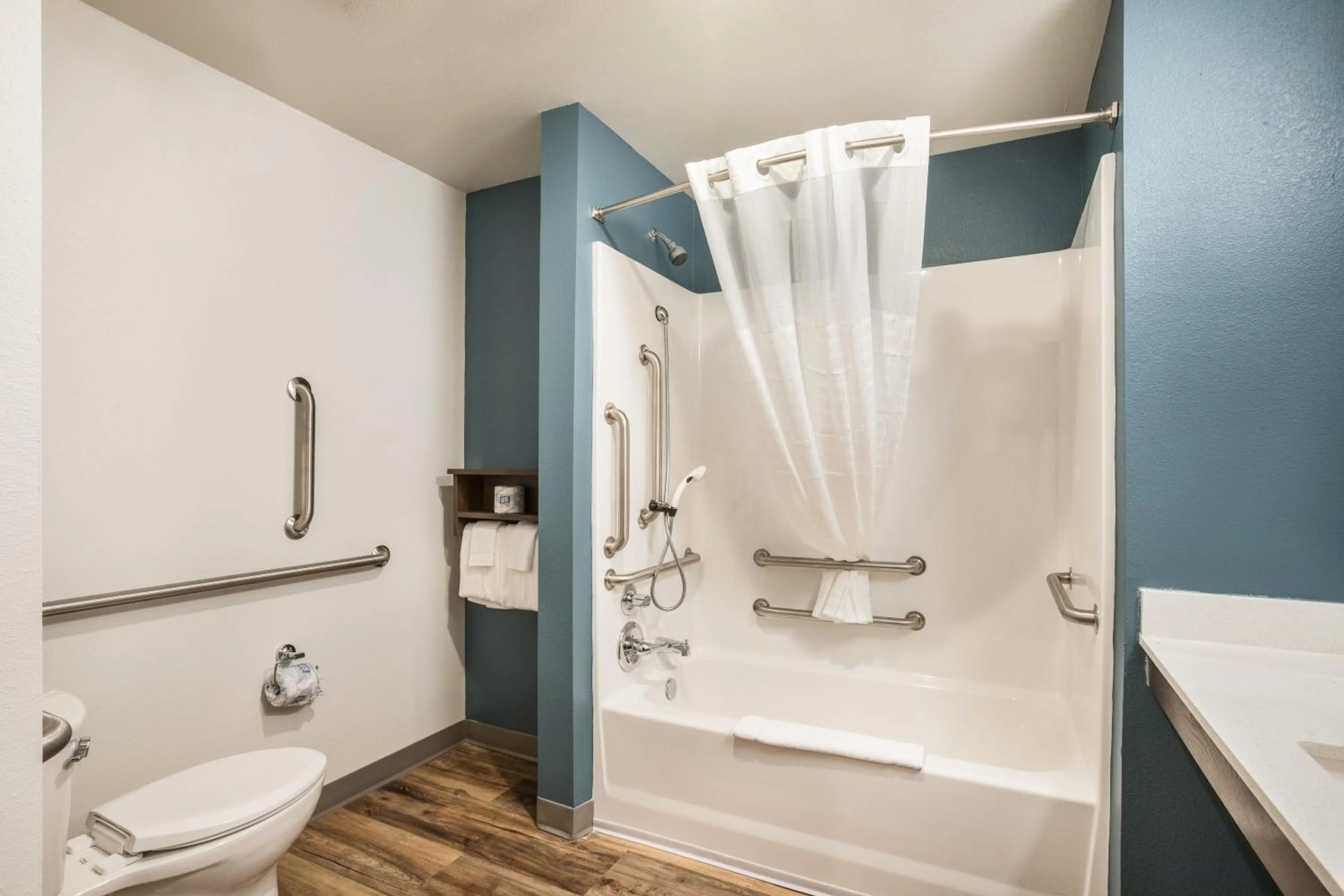 Bathroom in WoodSpring Suites Orlando I-4 & Convention Center