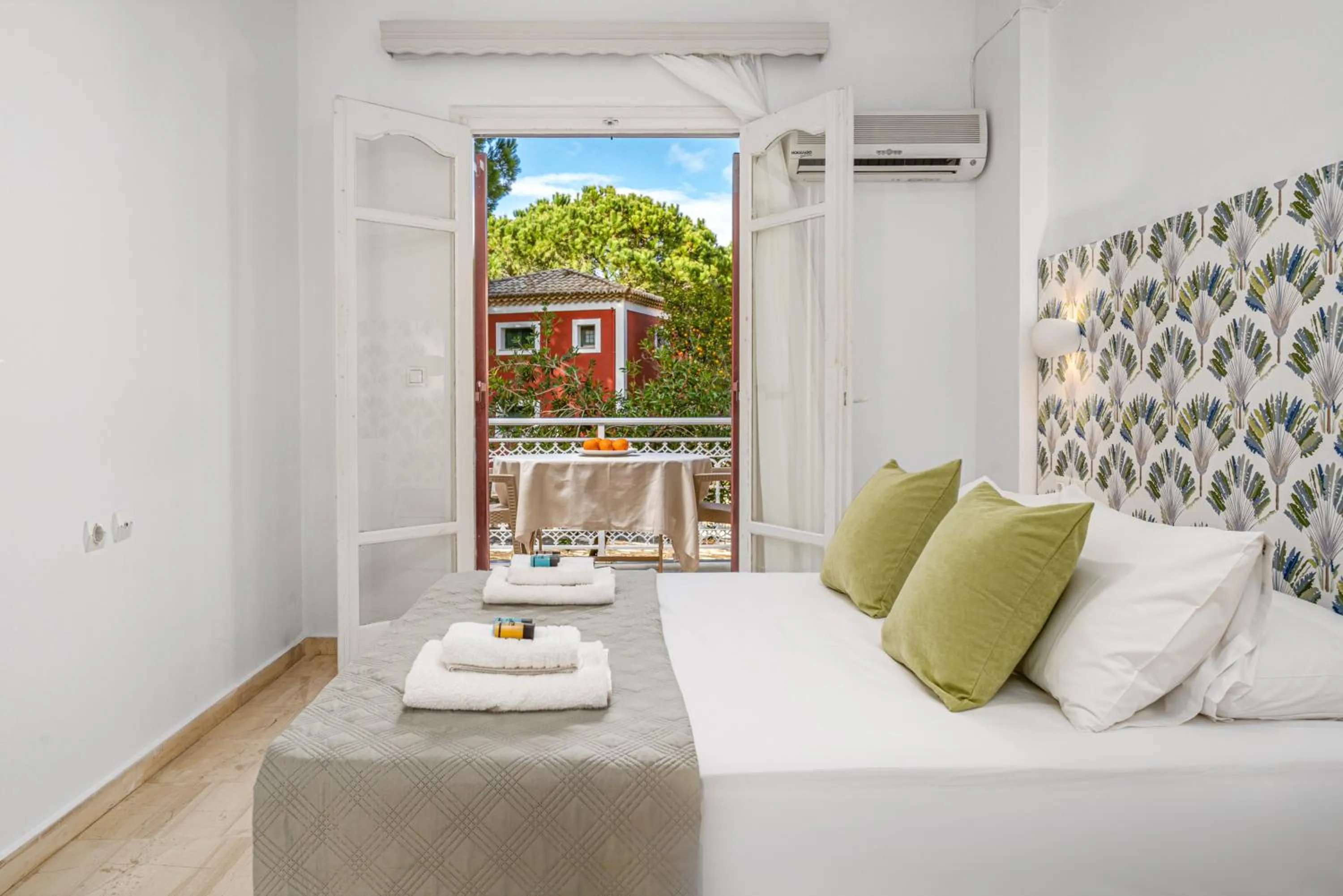 Bed in Pyrgaraki Studios and Apartments