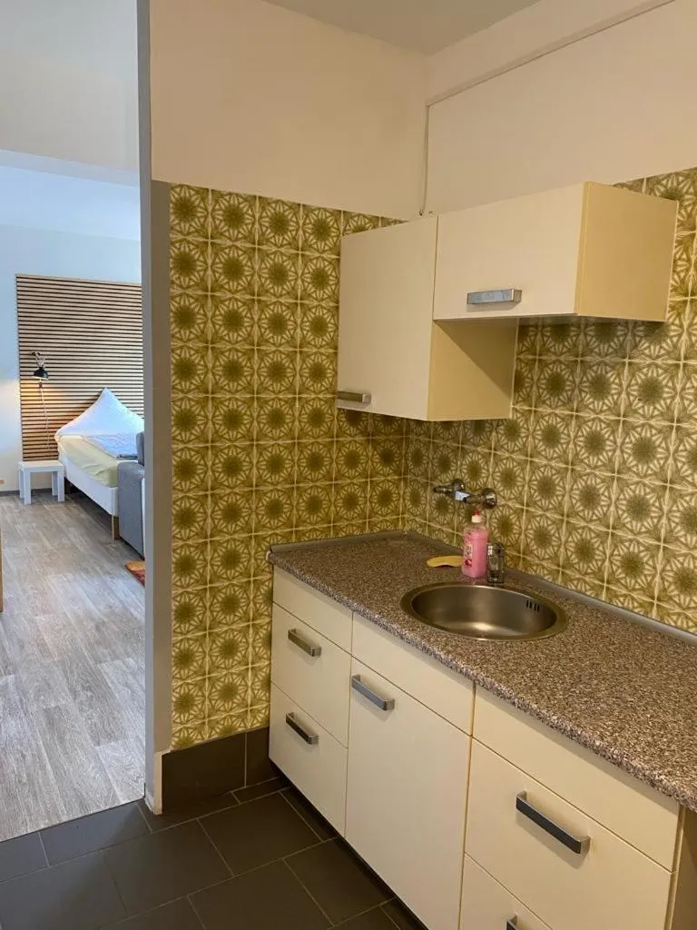 Kitchen or kitchenette, Bed in Hotel Niedersachsen