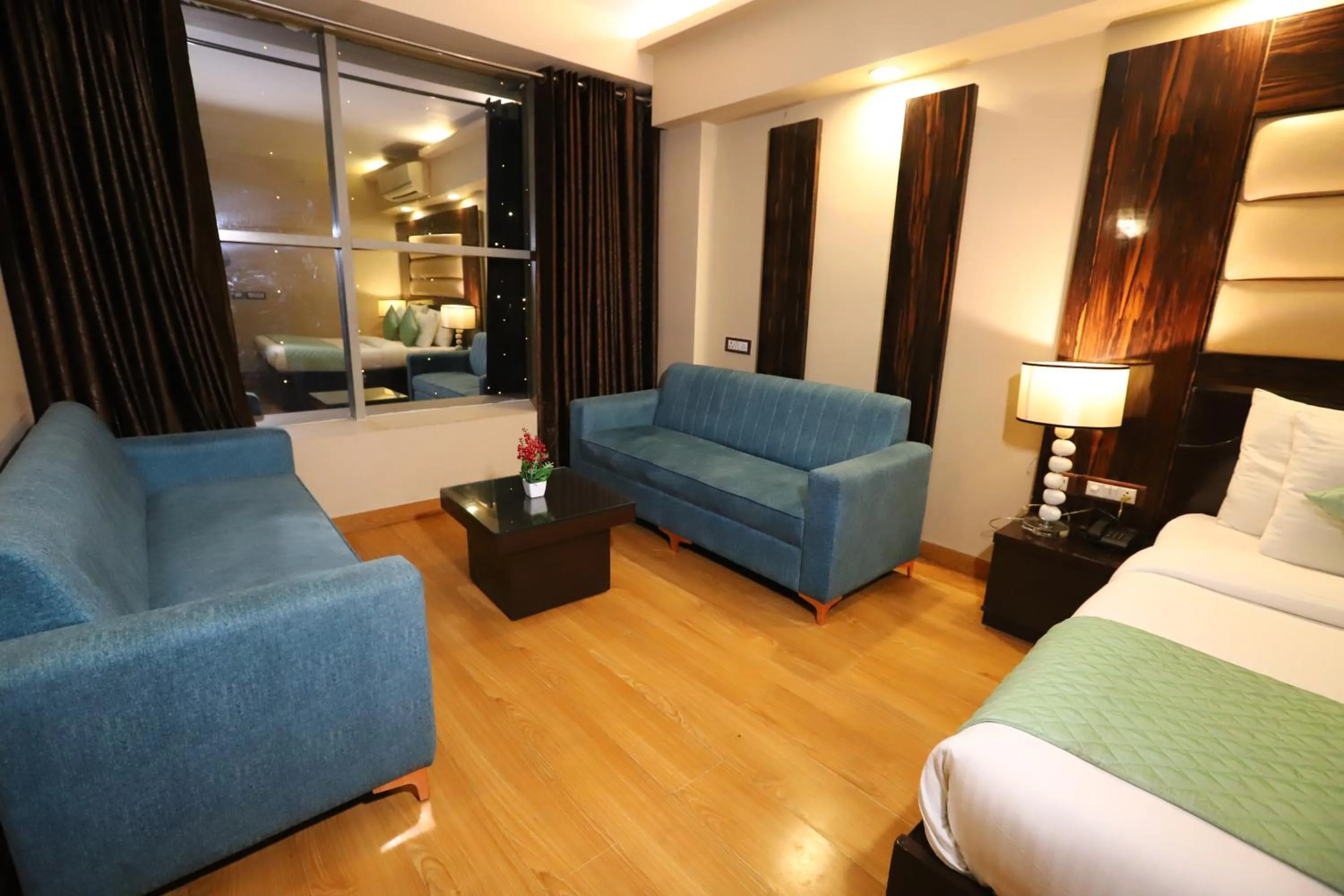 Living room, Bed in Hotel Palm Grand Naraina New Delhi - Couple Friendly Local IDs Accepted