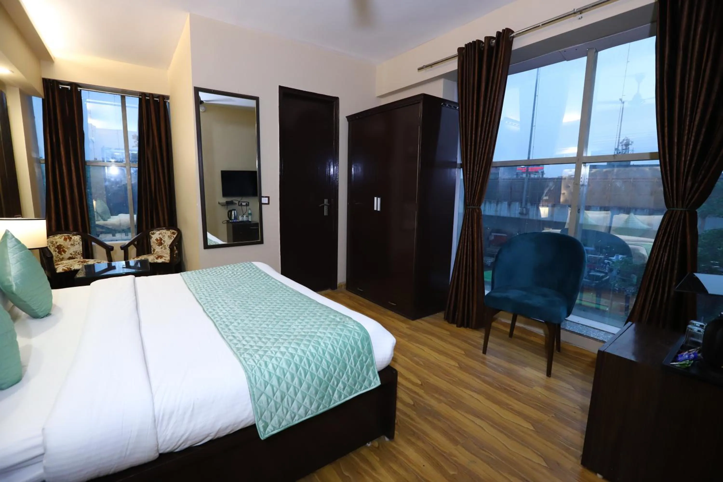 Photo of the whole room, Bed in Hotel Palm Grand Naraina New Delhi - Couple Friendly Local IDs Accepted