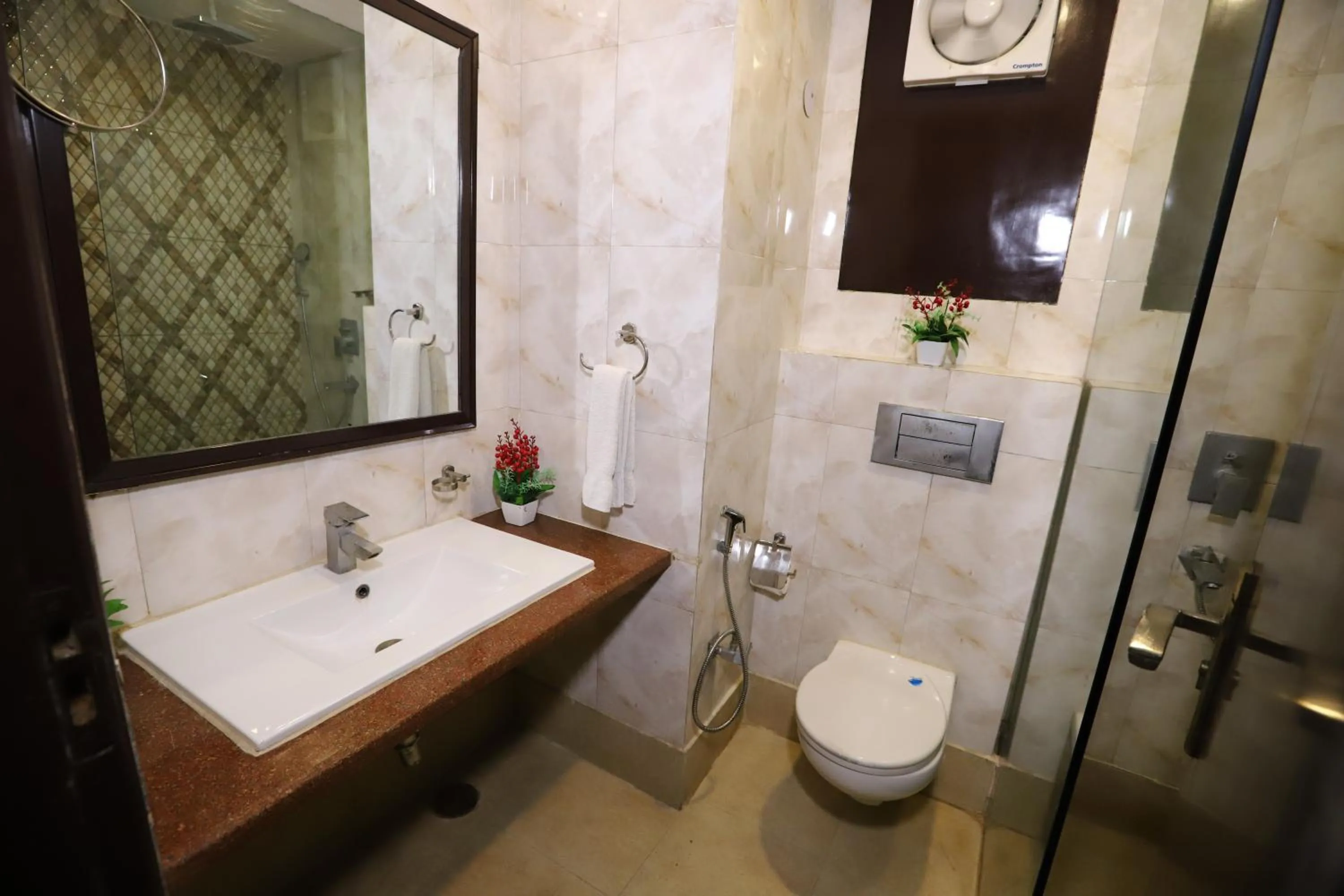 Bathroom in Hotel Palm Grand Naraina New Delhi - Couple Friendly Local IDs Accepted