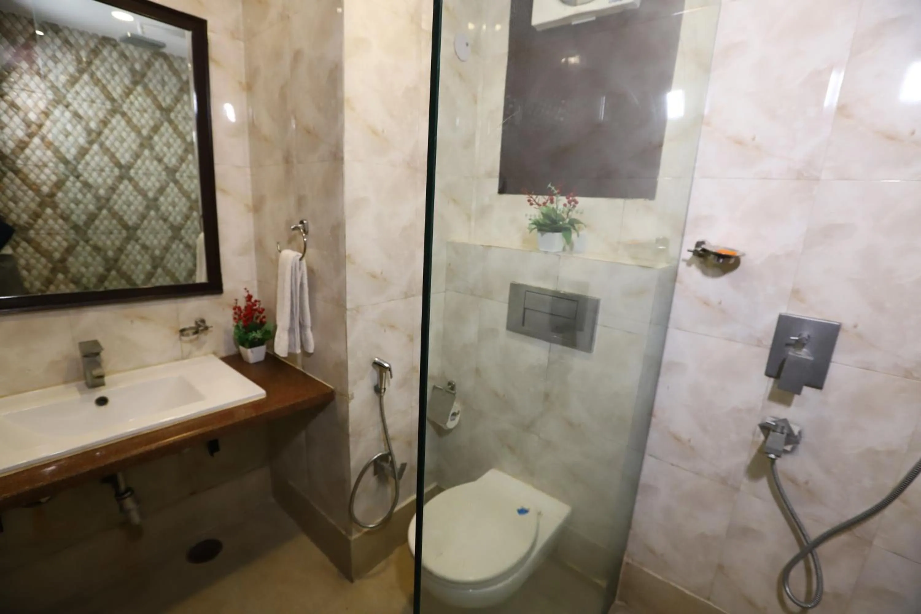 Bathroom in Hotel Palm Grand Naraina New Delhi - Couple Friendly Local IDs Accepted