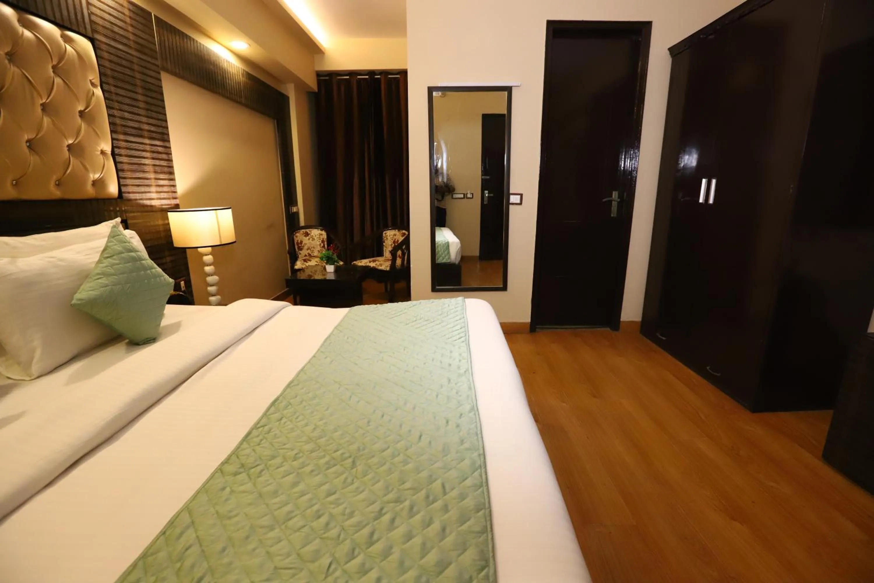 Photo of the whole room, Bed in Hotel Palm Grand Naraina New Delhi - Couple Friendly Local IDs Accepted