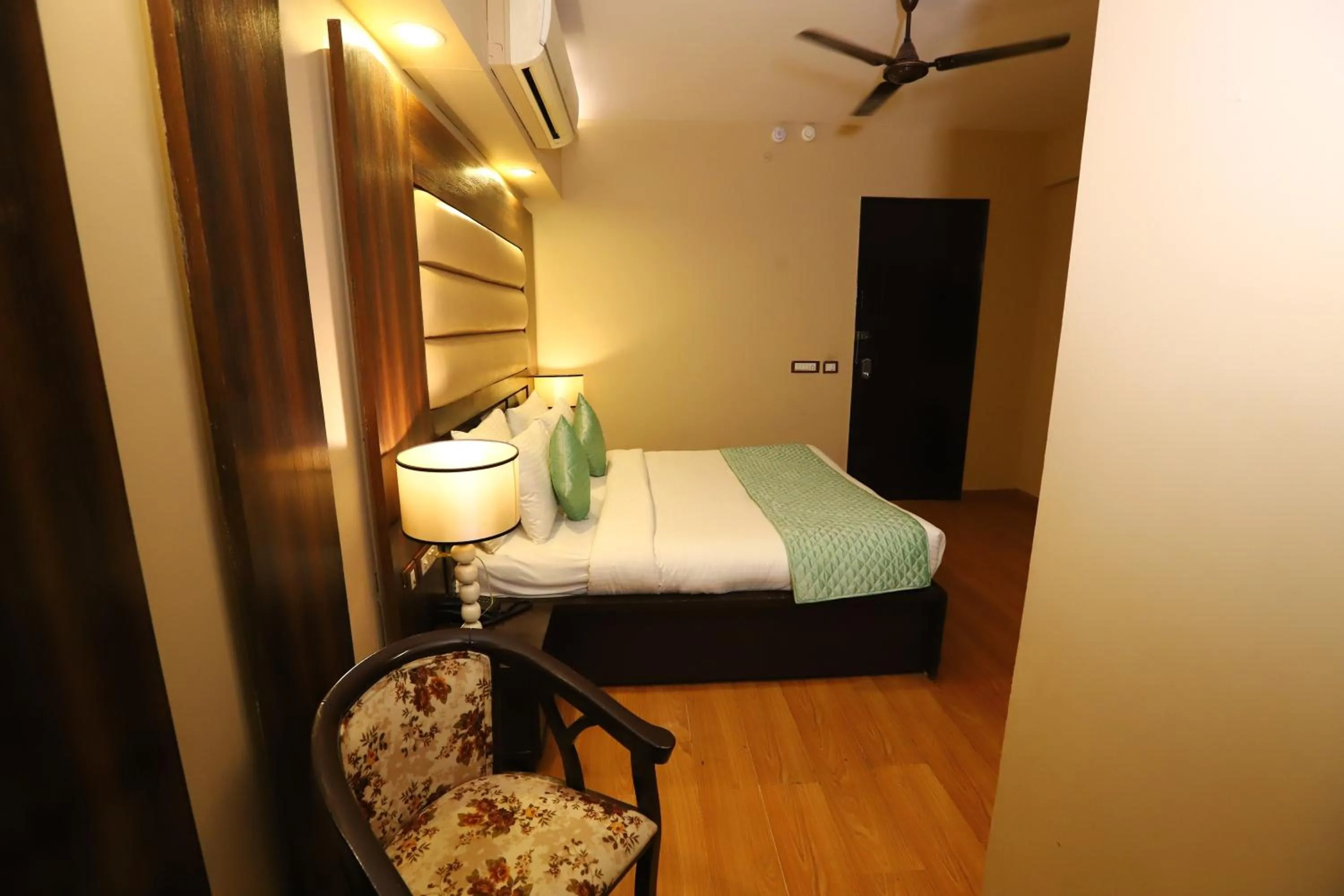 Photo of the whole room, Bed in Hotel Palm Grand Naraina New Delhi - Couple Friendly Local IDs Accepted