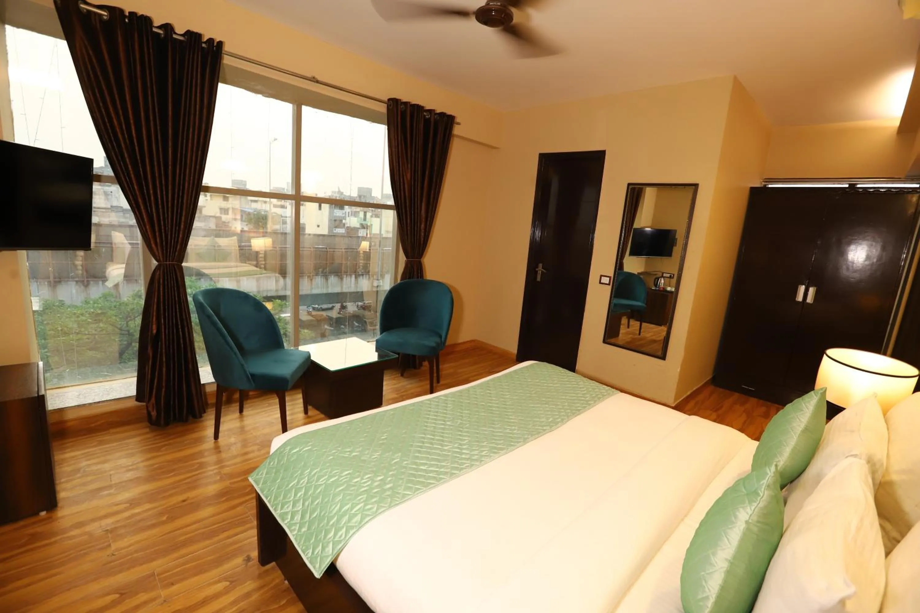 Photo of the whole room, Bed in Hotel Palm Grand Naraina New Delhi - Couple Friendly Local IDs Accepted