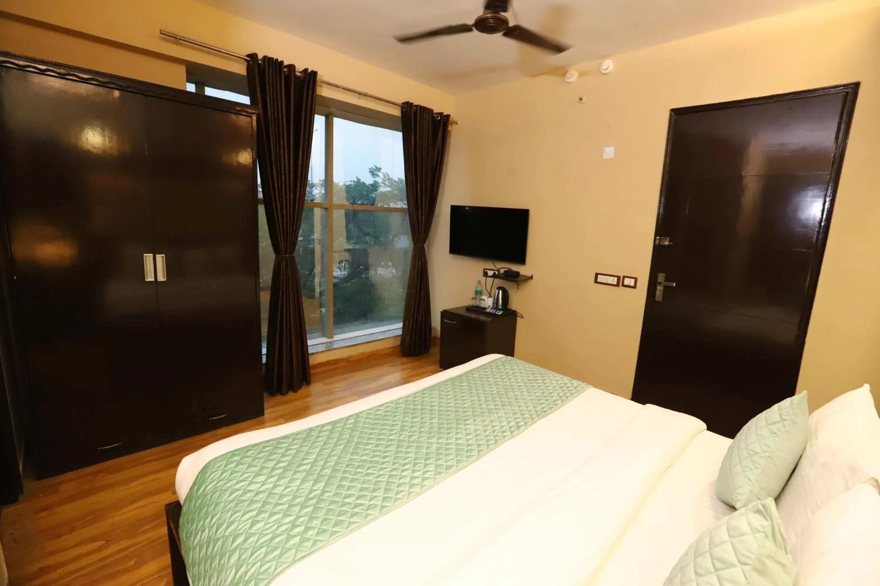 Bed in Hotel Palm Grand Naraina New Delhi - Couple Friendly Local IDs Accepted
