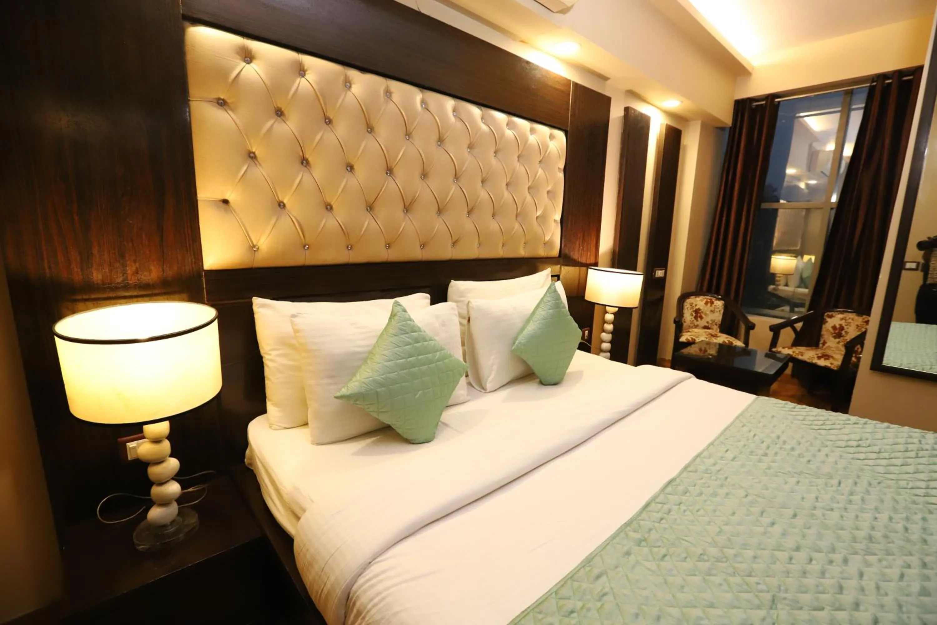 Photo of the whole room, Bed in Hotel Palm Grand Naraina New Delhi - Couple Friendly Local IDs Accepted