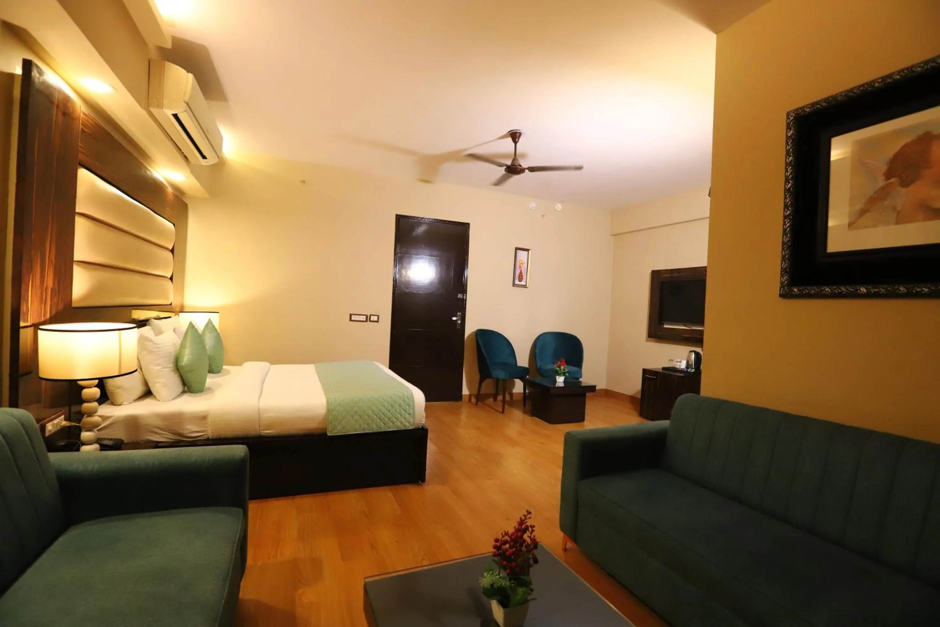 Seating area, Bed in Hotel Palm Grand Naraina New Delhi - Couple Friendly Local IDs Accepted