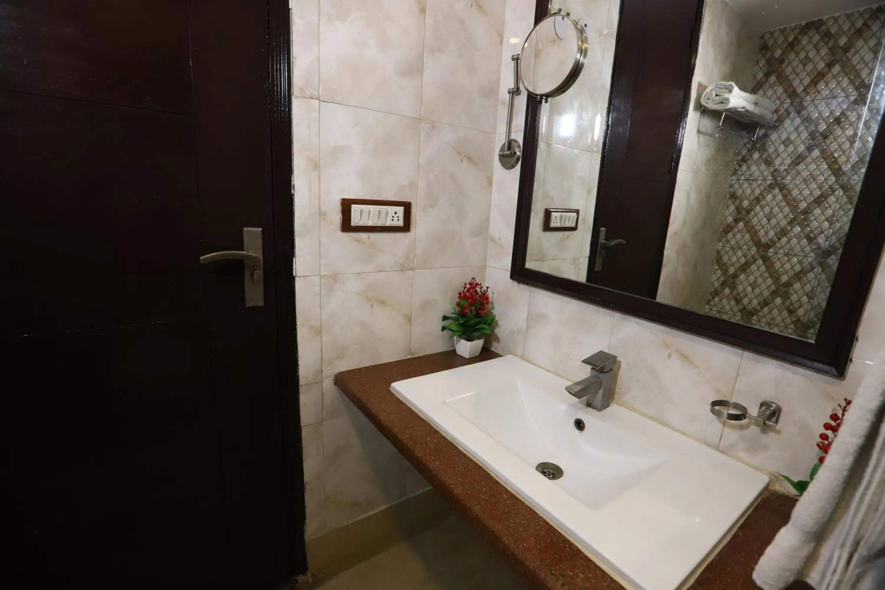 Bathroom in Hotel Palm Grand Naraina New Delhi - Couple Friendly Local IDs Accepted