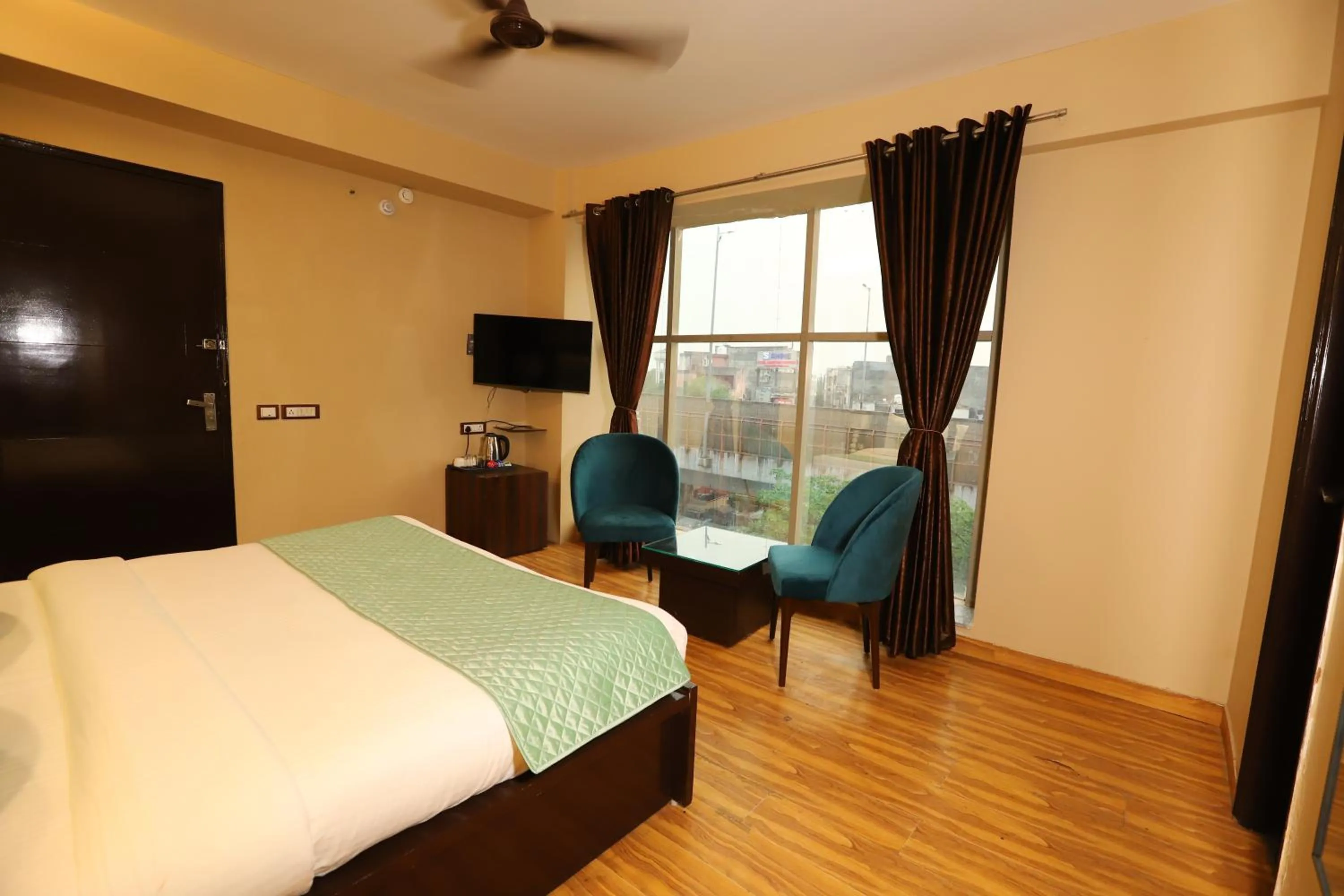 TV and multimedia, Bed in Hotel Palm Grand Naraina New Delhi - Couple Friendly Local IDs Accepted
