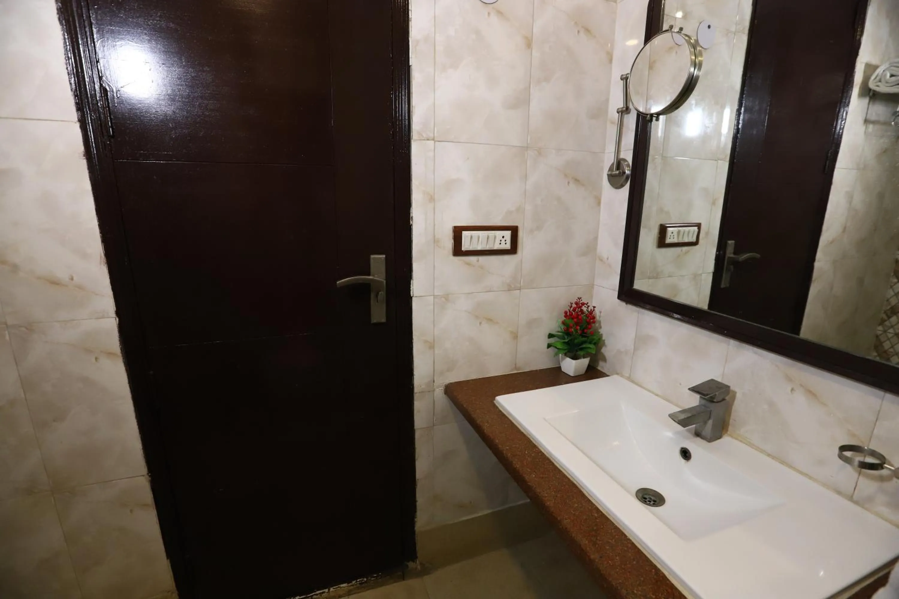 Bathroom in Hotel Palm Grand Naraina New Delhi - Couple Friendly Local IDs Accepted