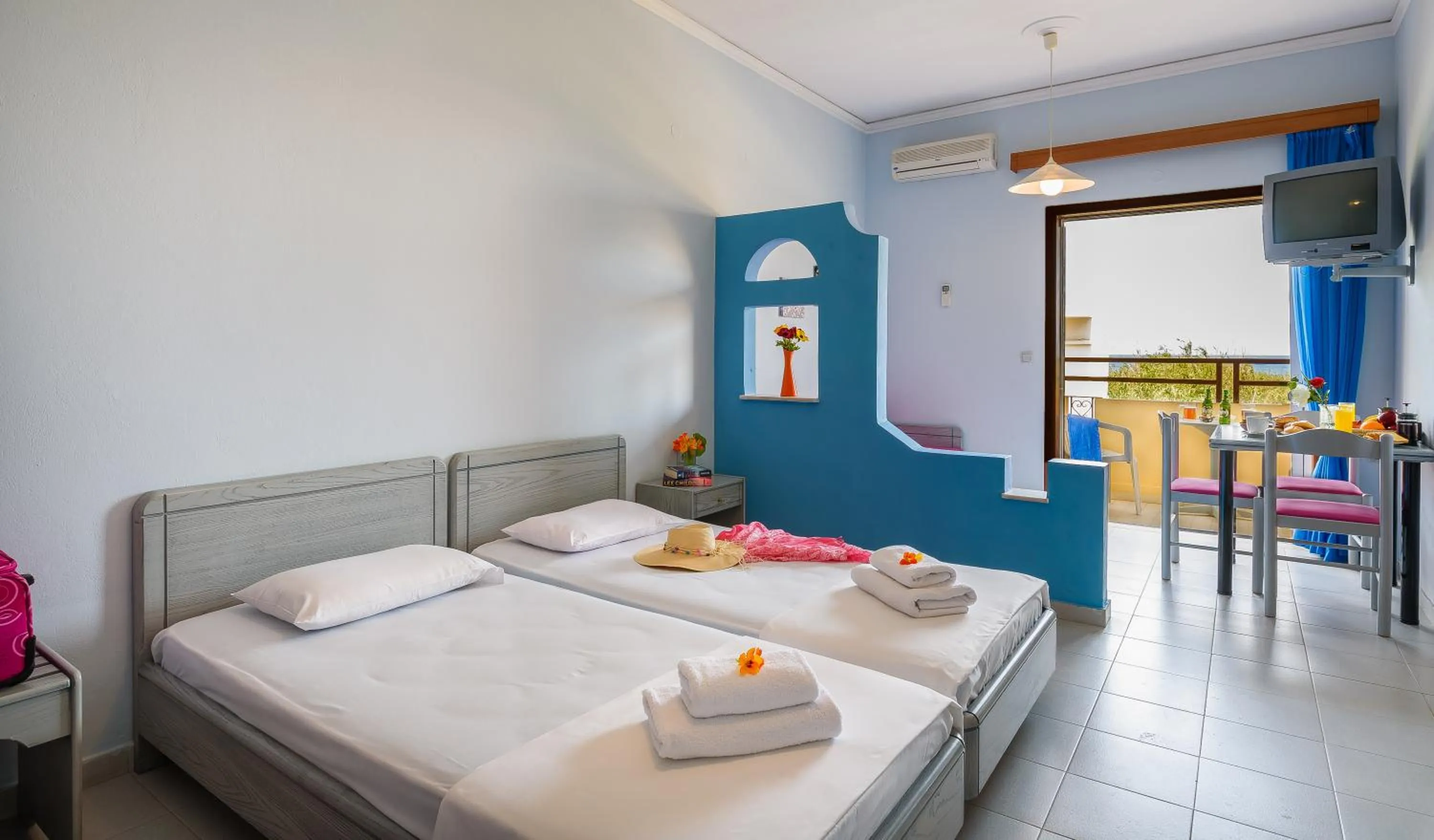 Bed in Louladakis Apartments