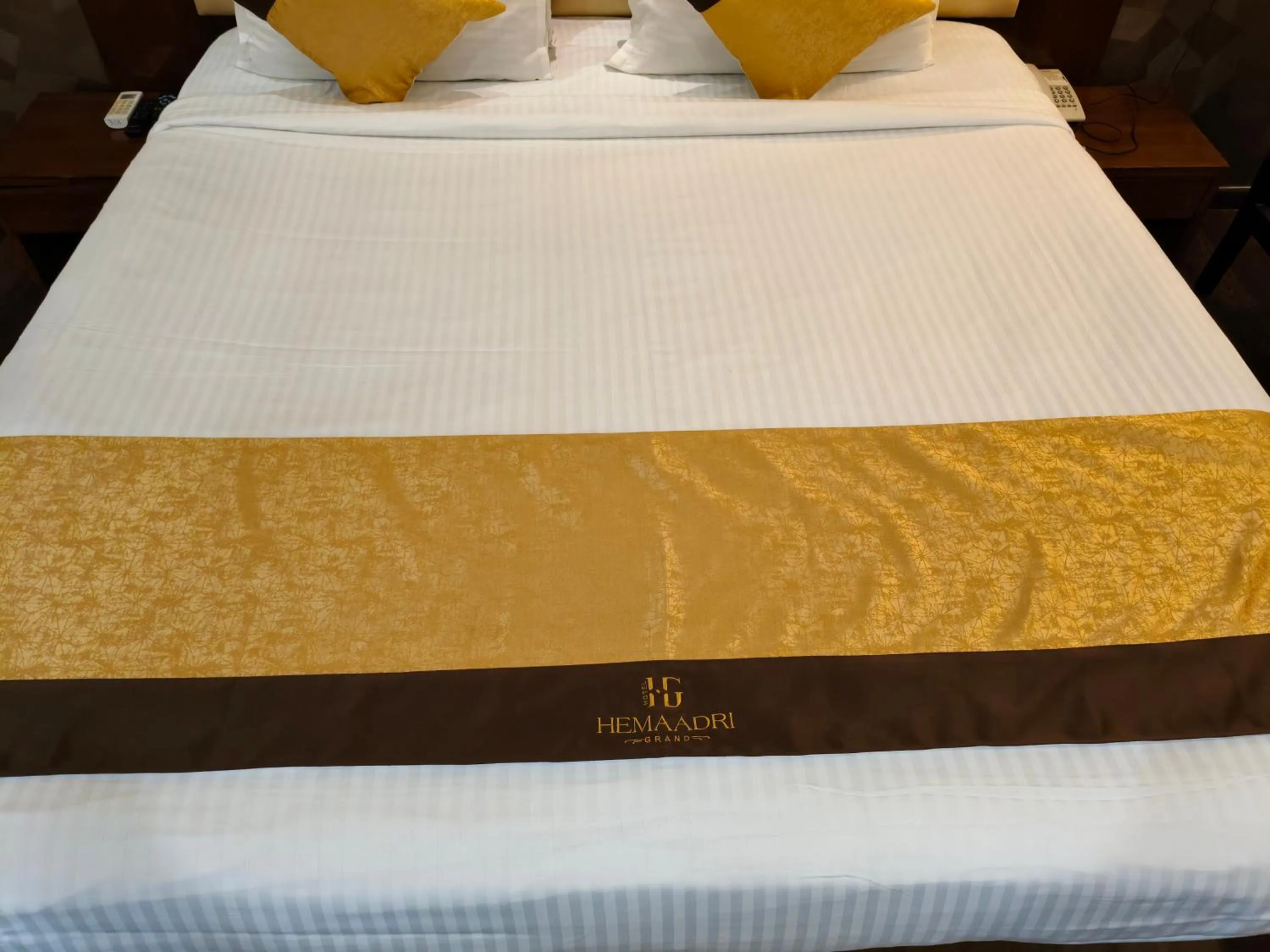 Bed in Hemaadri Grand