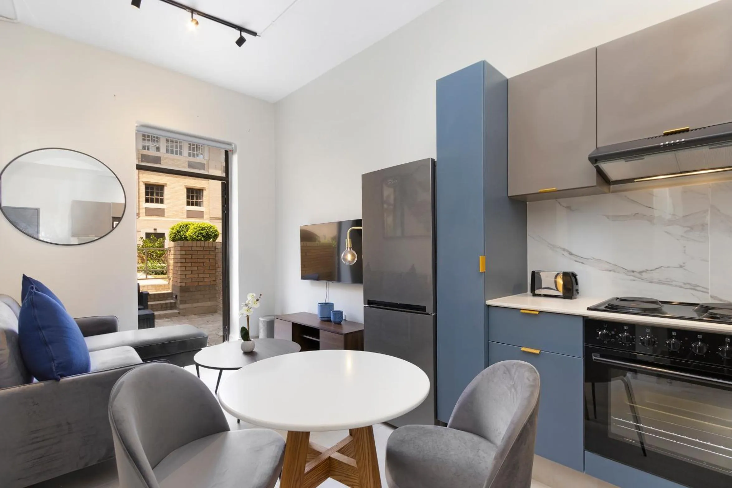 Kitchen or kitchenette in The Archer Aparthotel by Totalstay