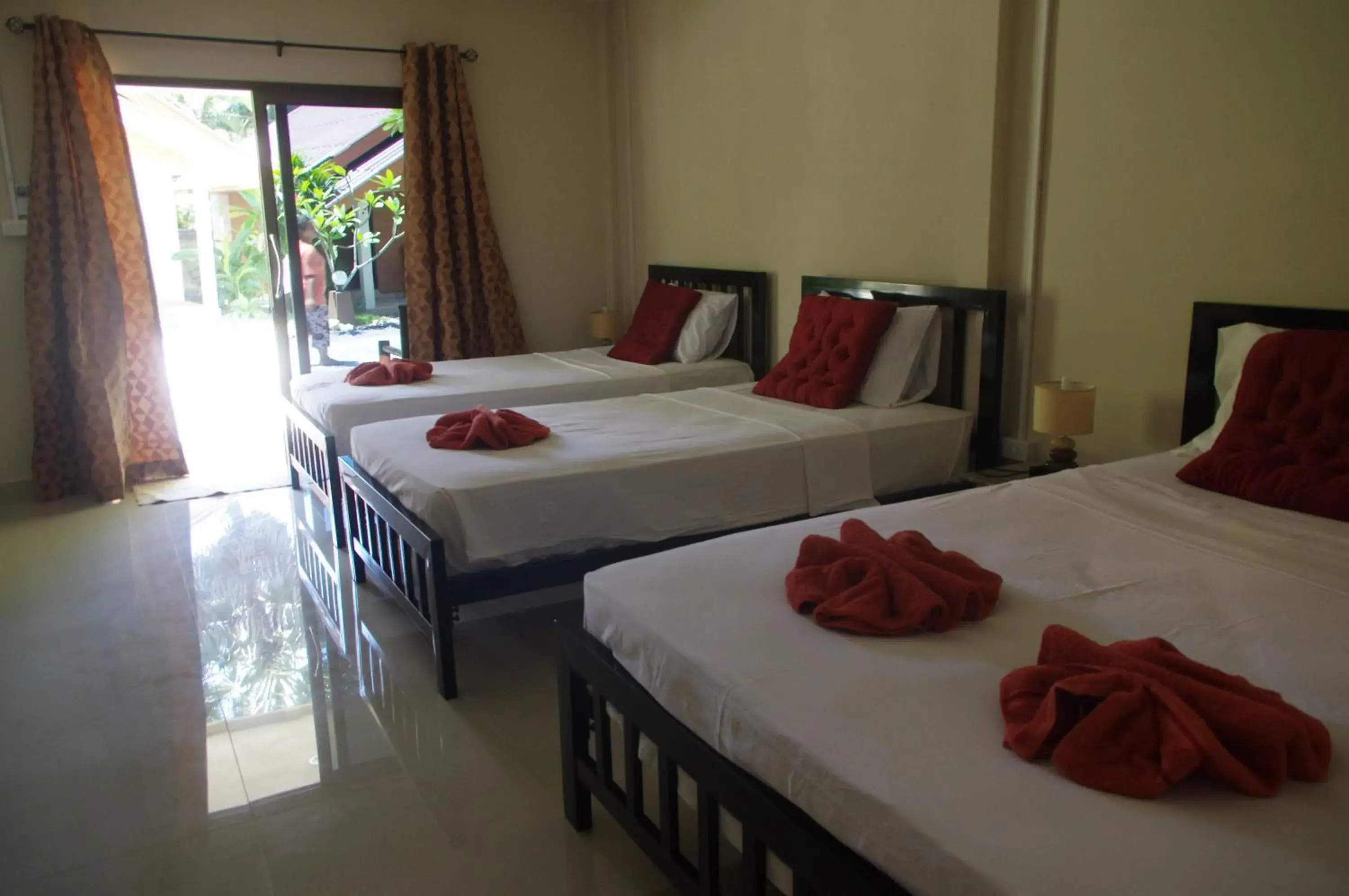 Standard Quadruple Room in Thai House Beach Resort Standard Quadruple Room in Thai House Beach Resort