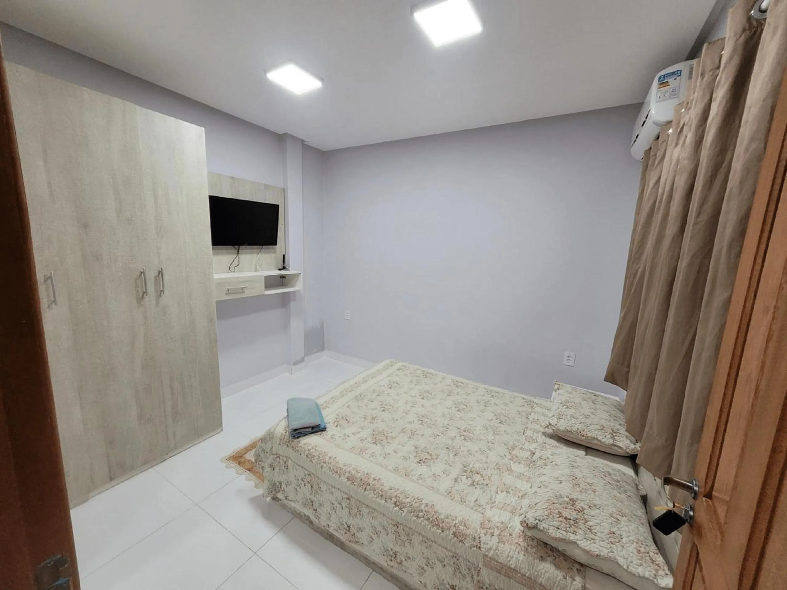 View (from property/room), Bed in Hotel Residencial Manaus - Flores