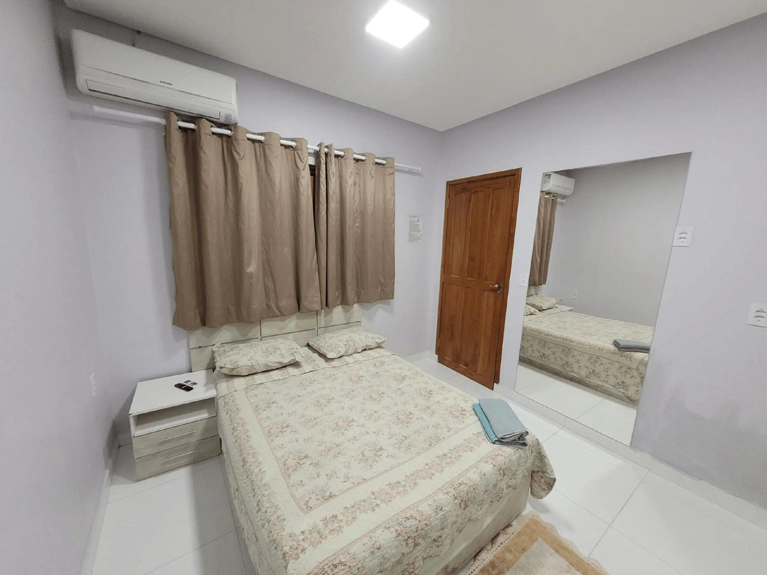 View (from property/room), Bed in Hotel Residencial Manaus - Flores