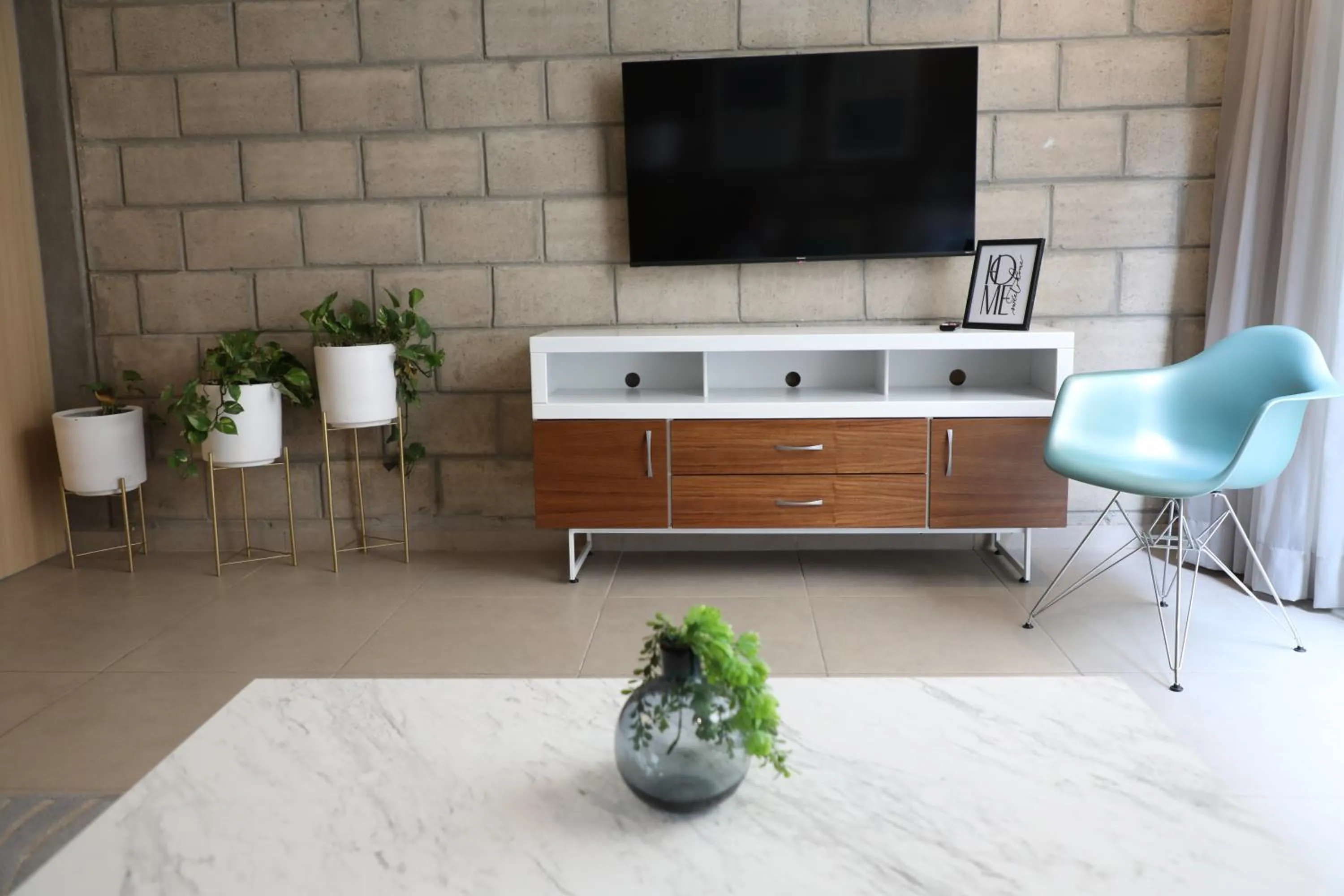 Communal lounge/ TV room in Tribu Centro Histórico