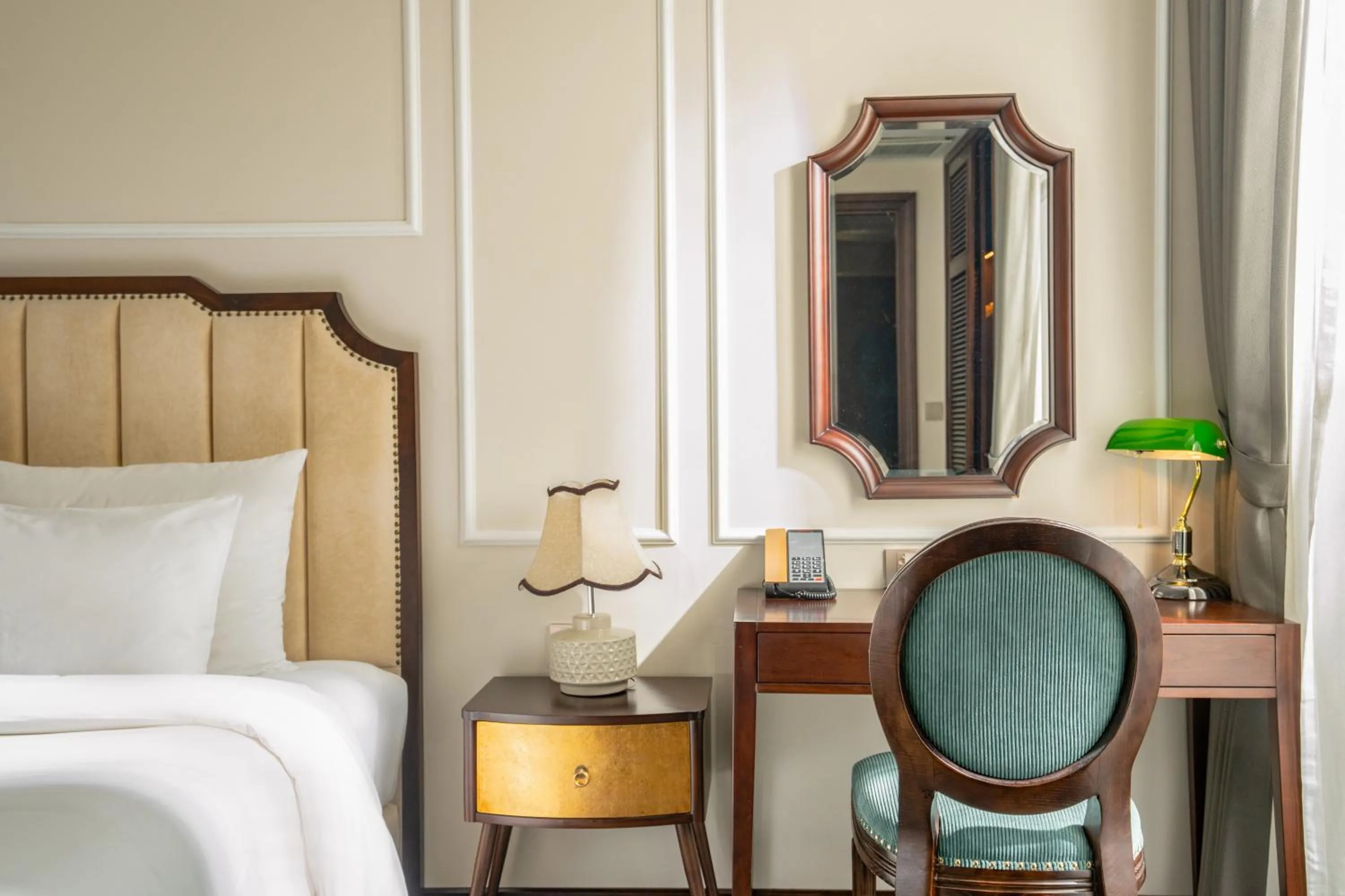 Bed in GM Premium Hotel