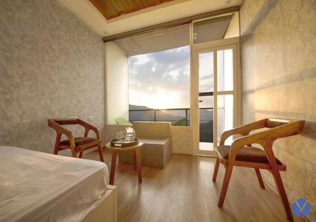 Seating area, Bed in The Yakshaa Neelkanth