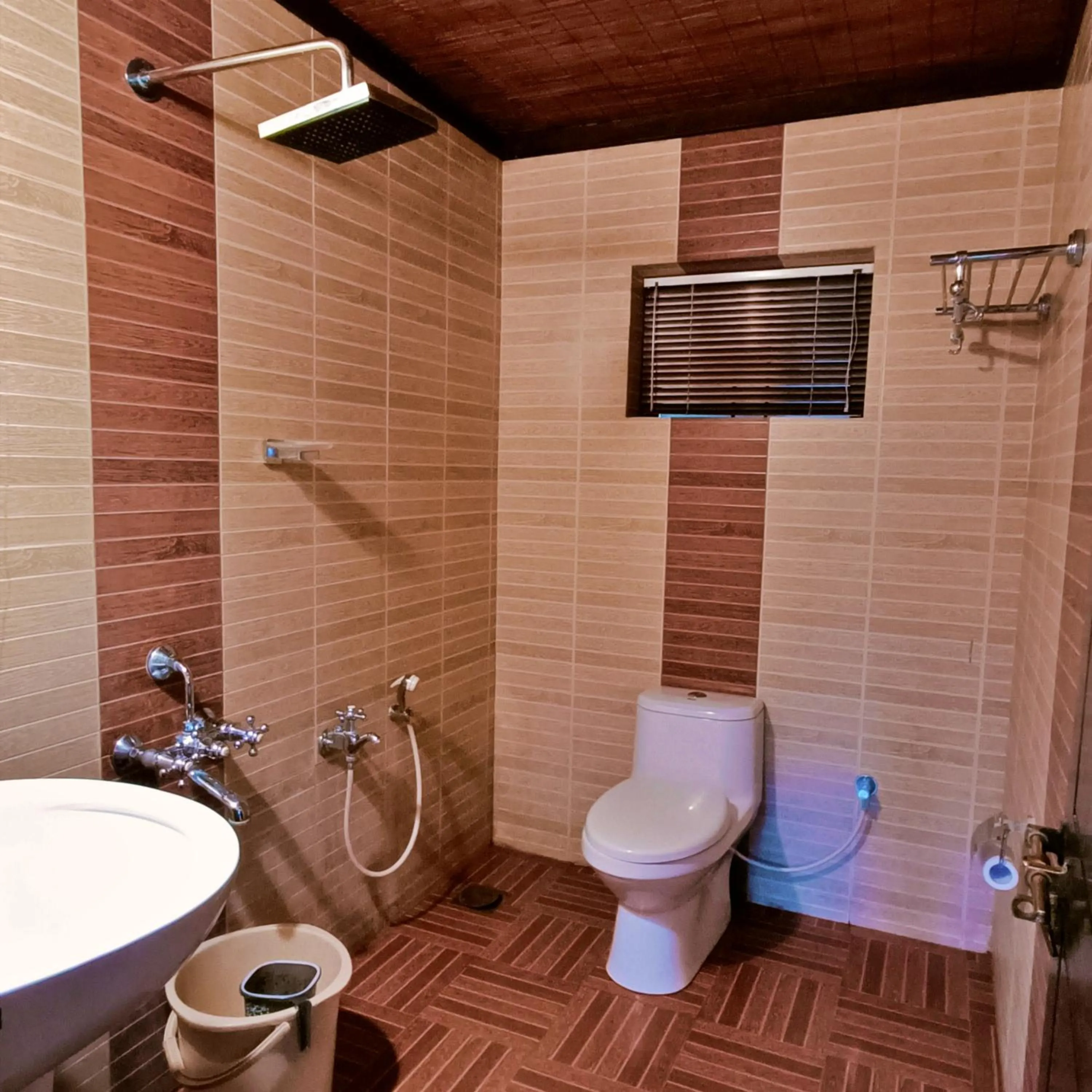 Shower in Adrak Mountain Mist Forest Resort