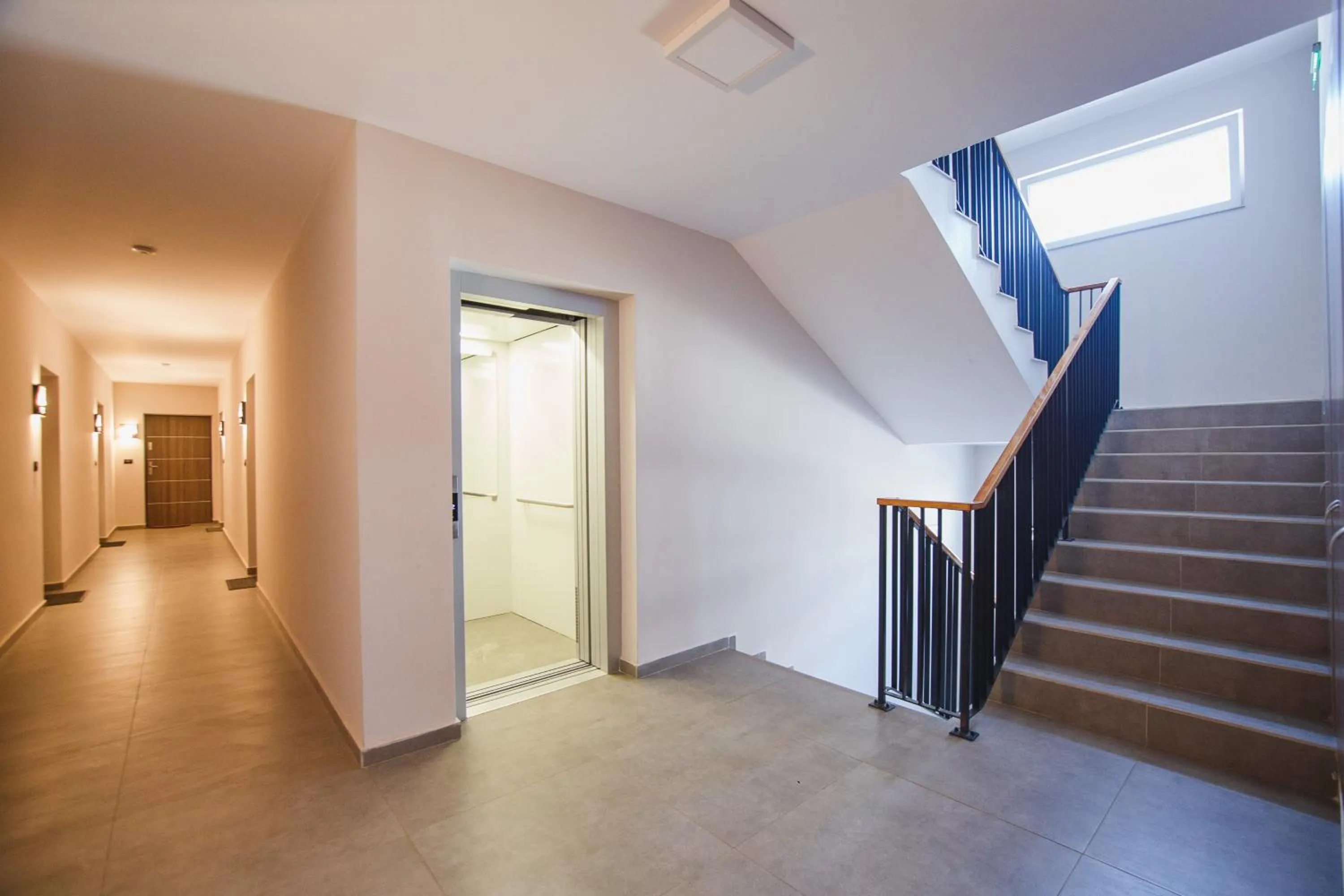 elevator in Retreat to a Stylish Home at West Residence