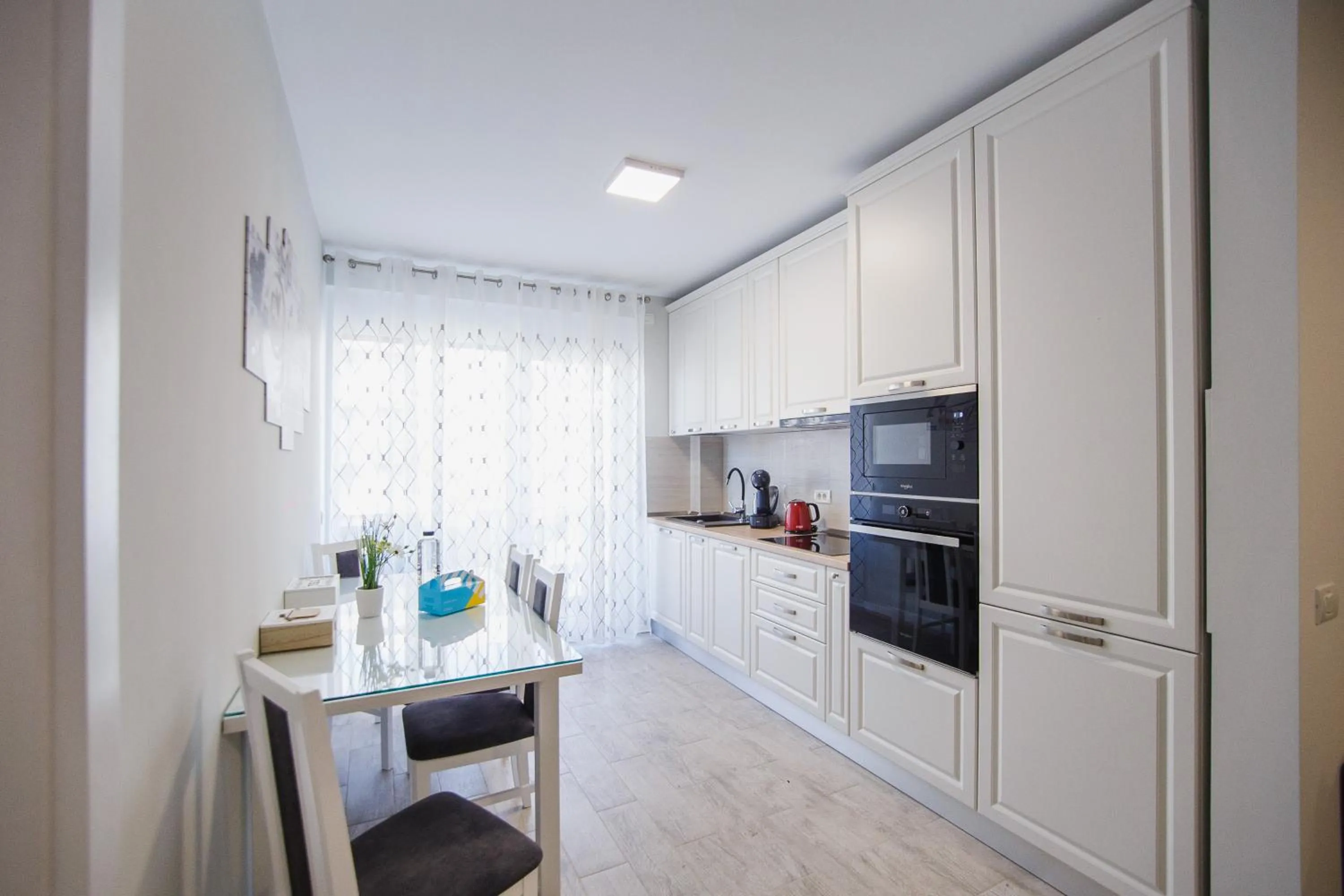 Kitchen or kitchenette in Retreat to a Stylish Home at West Residence