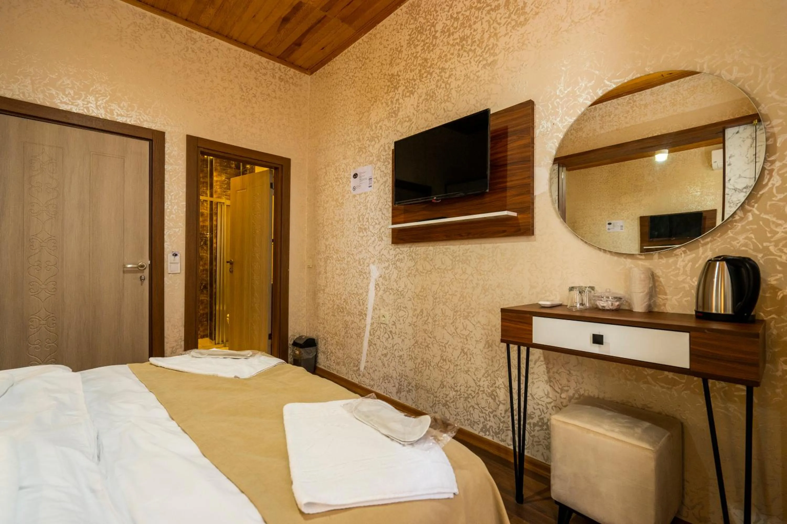 Communal lounge/ TV room, Bed in Candy Hotel