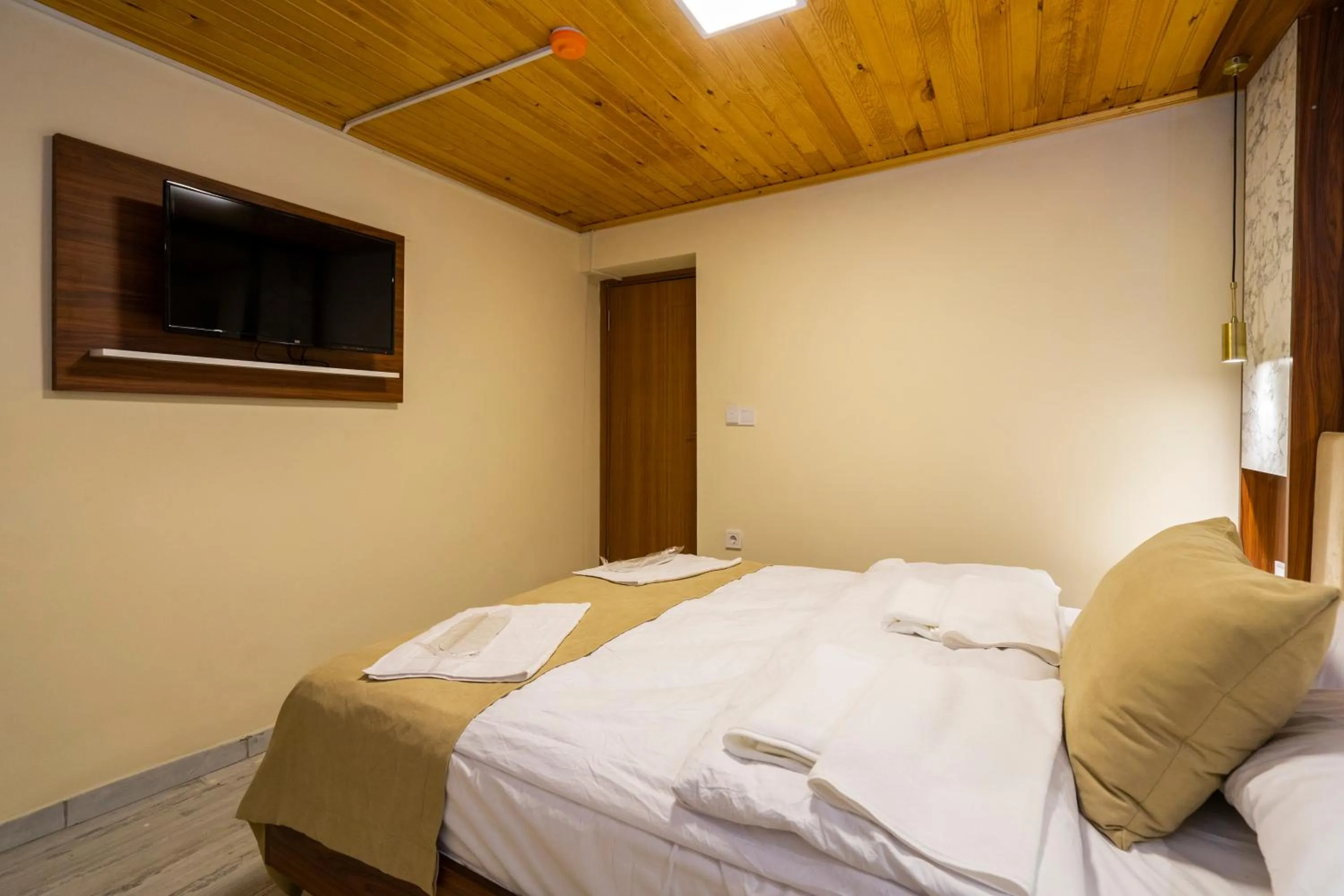 Communal lounge/ TV room, Bed in Candy Hotel