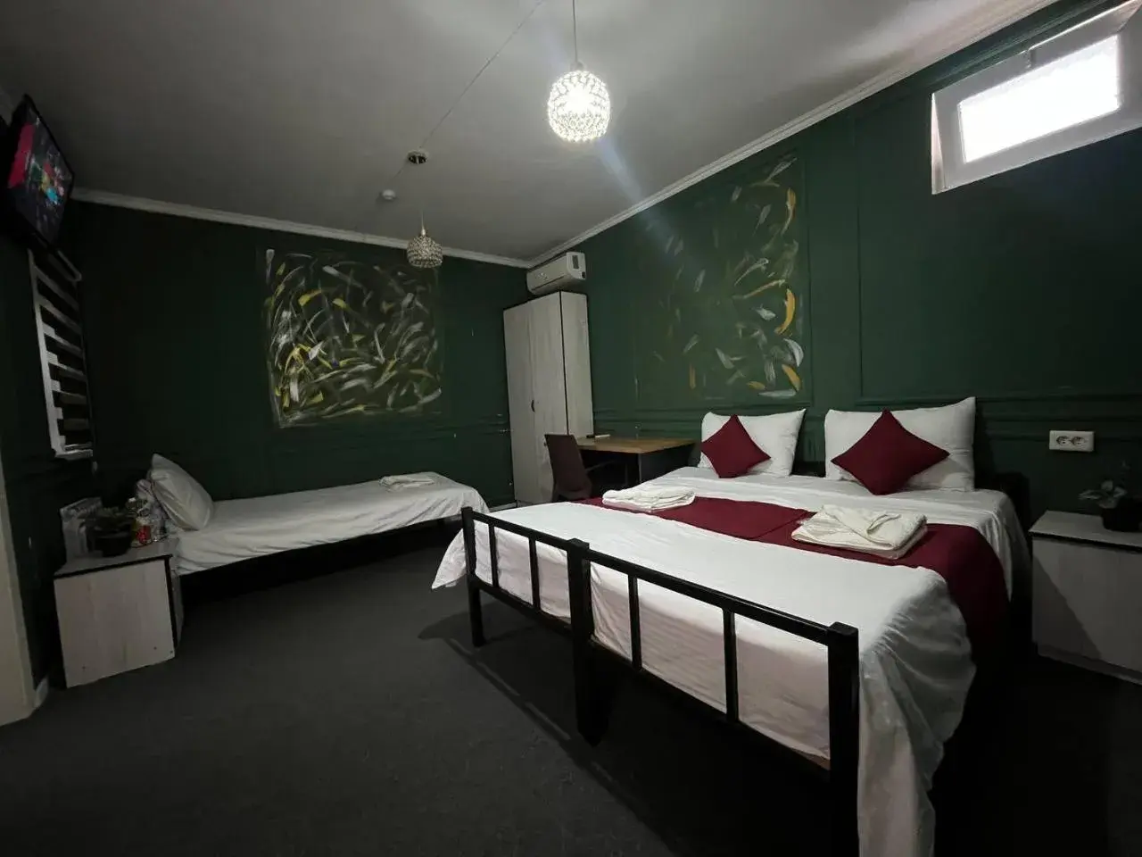 Triple Room with Bathroom in The Palms Hostel Triple Room with Bathroom in The Palms Hostel