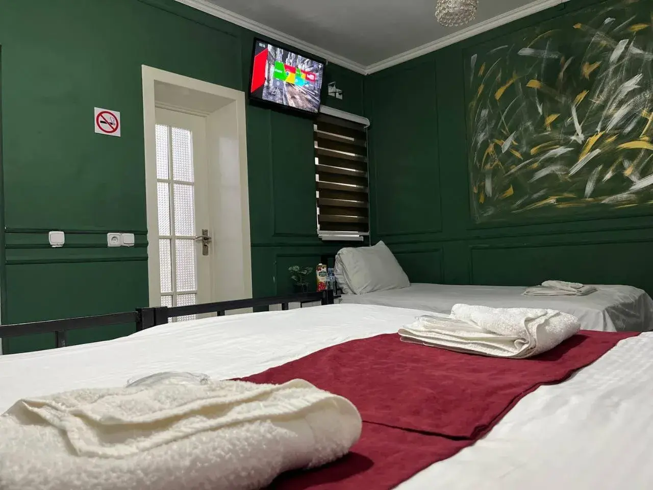 Triple Room with Bathroom in The Palms Hostel Triple Room with Bathroom in The Palms Hostel