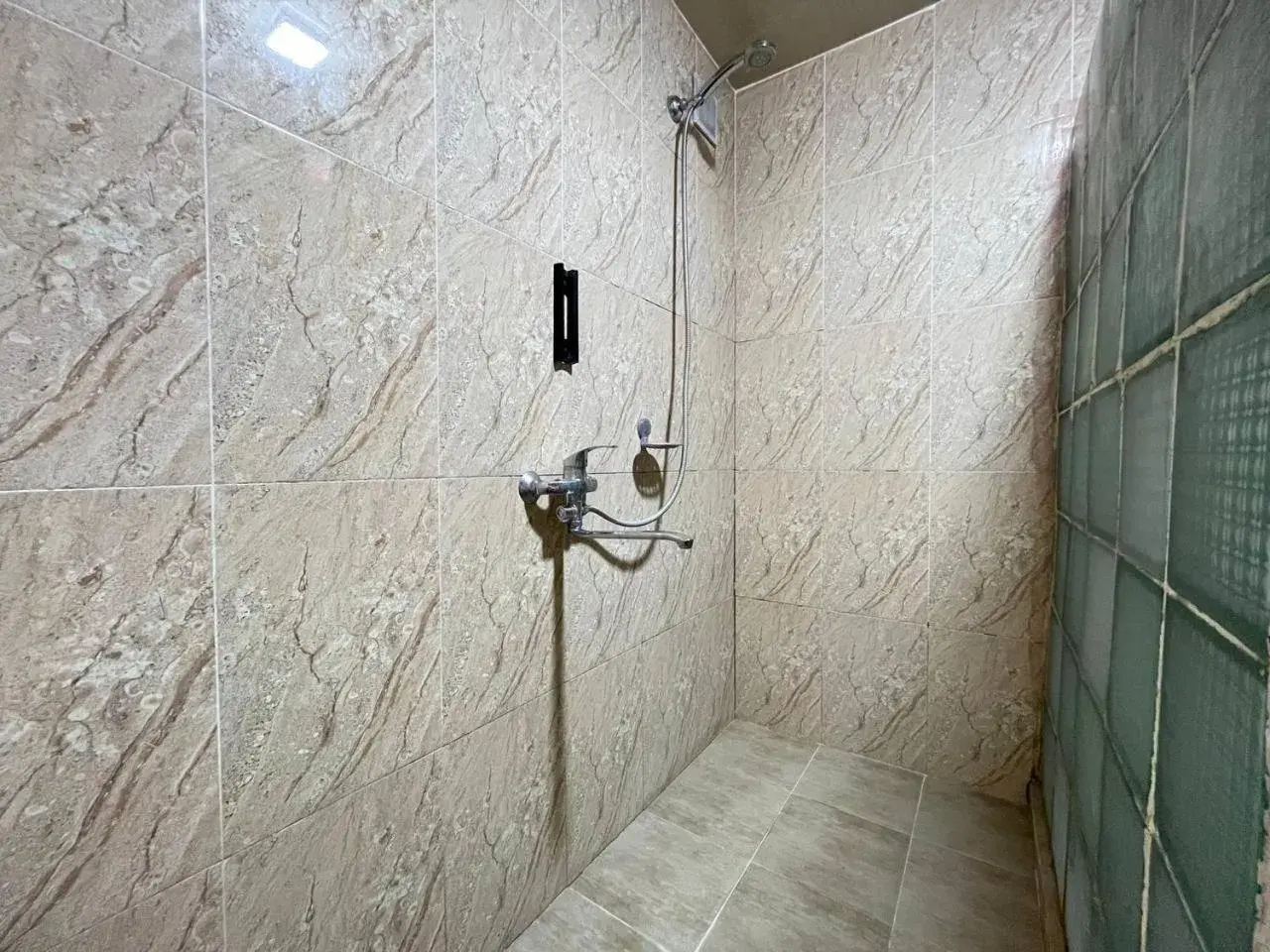 Quadruple Room with Bath in The Palms Hostel Quadruple Room with Bath in The Palms Hostel