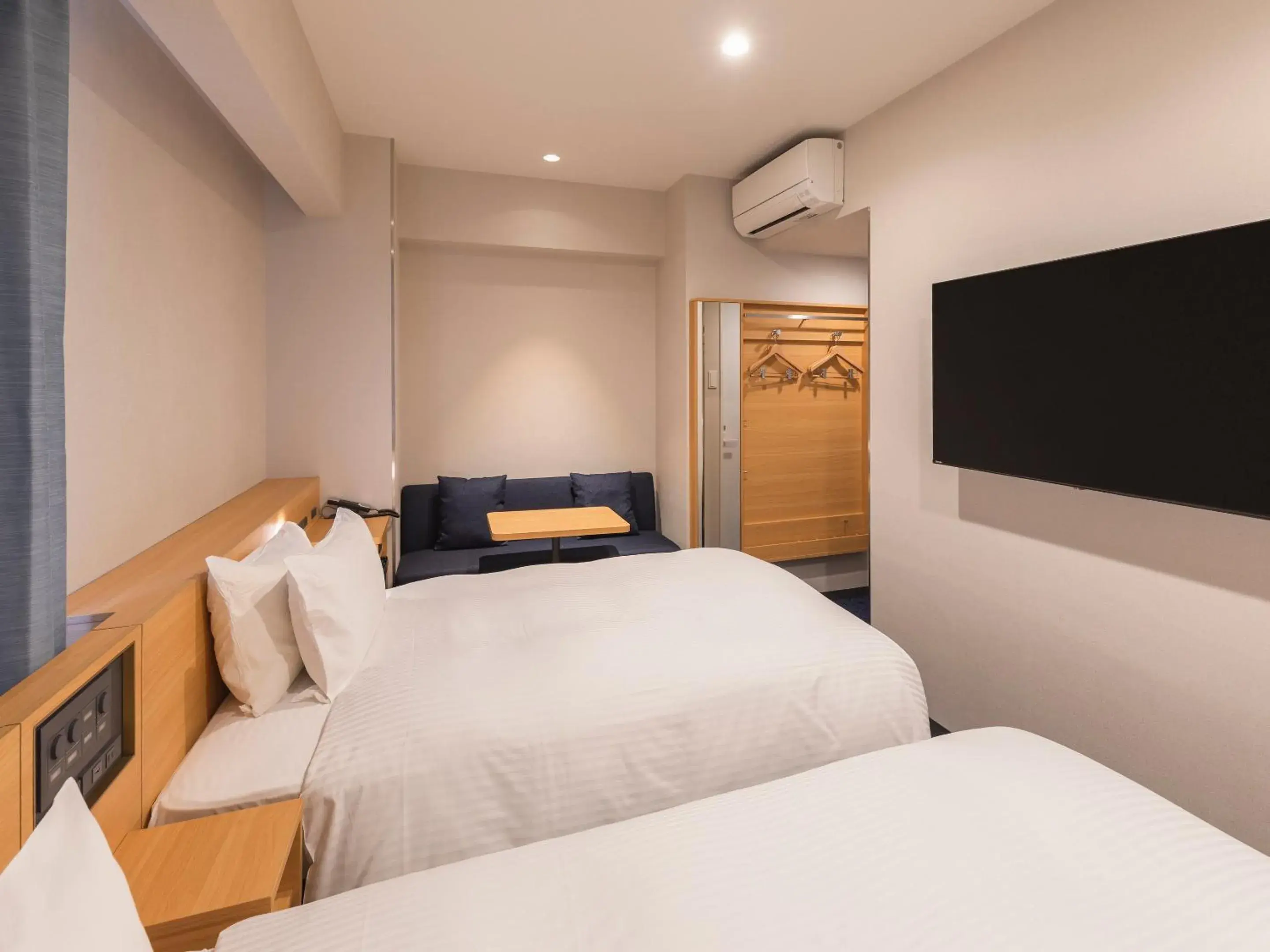 Bed in Sotetsu Fresa Inn Sendai Bed in Sotetsu Fresa Inn Sendai