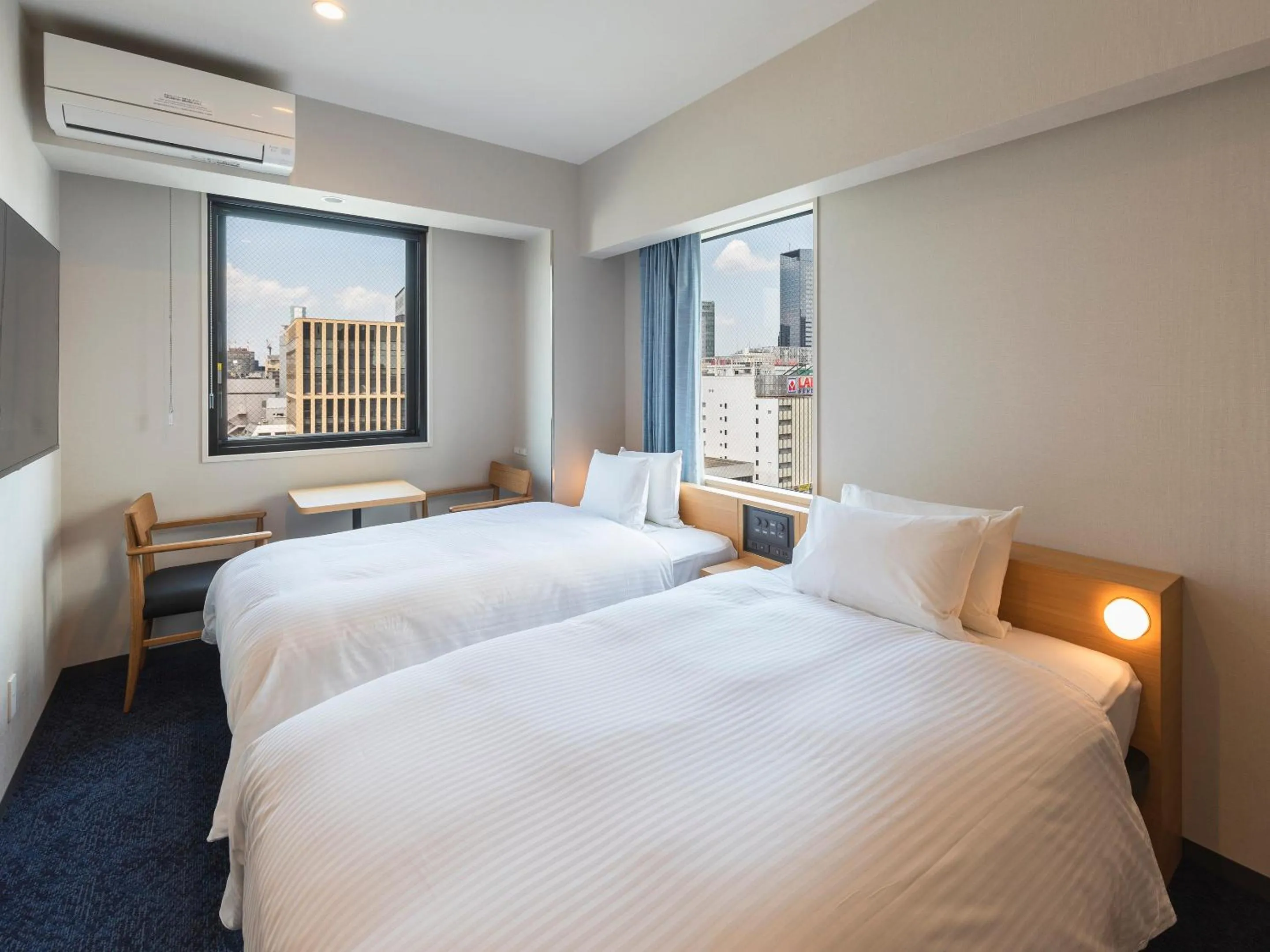 Bed in Sotetsu Fresa Inn Sendai