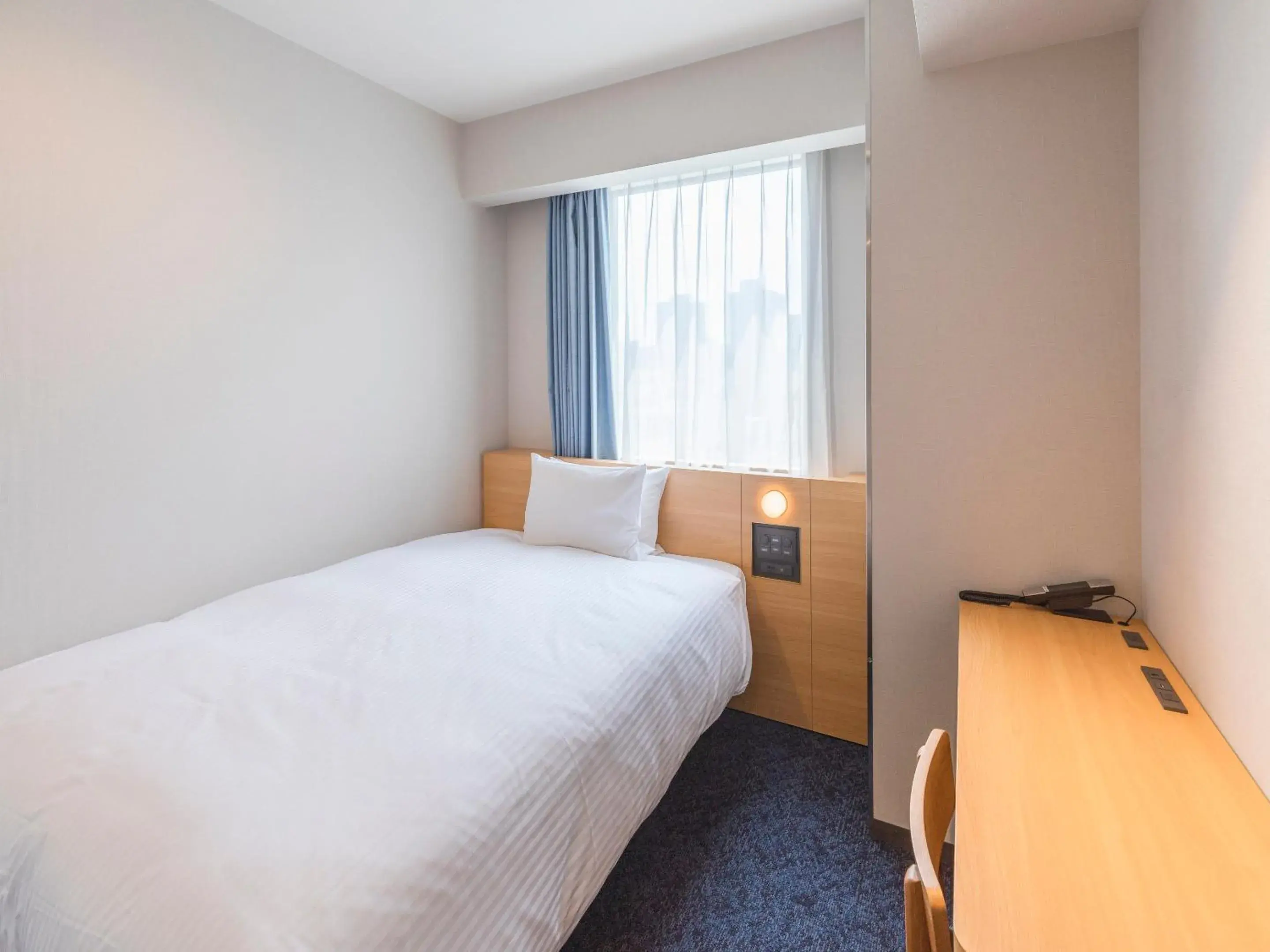 Bed in Sotetsu Fresa Inn Sendai Bed in Sotetsu Fresa Inn Sendai