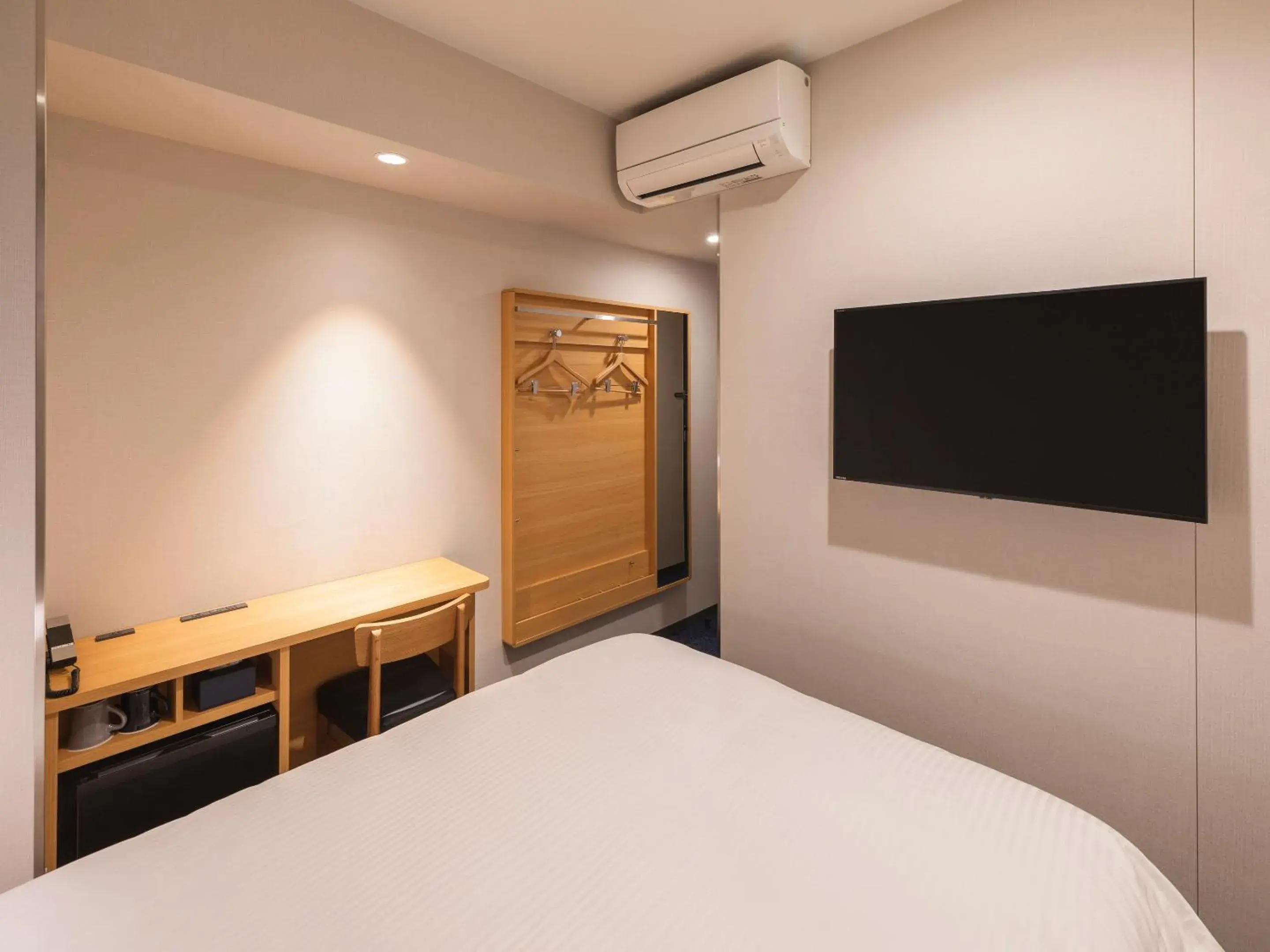 Bed in Sotetsu Fresa Inn Sendai Bed in Sotetsu Fresa Inn Sendai