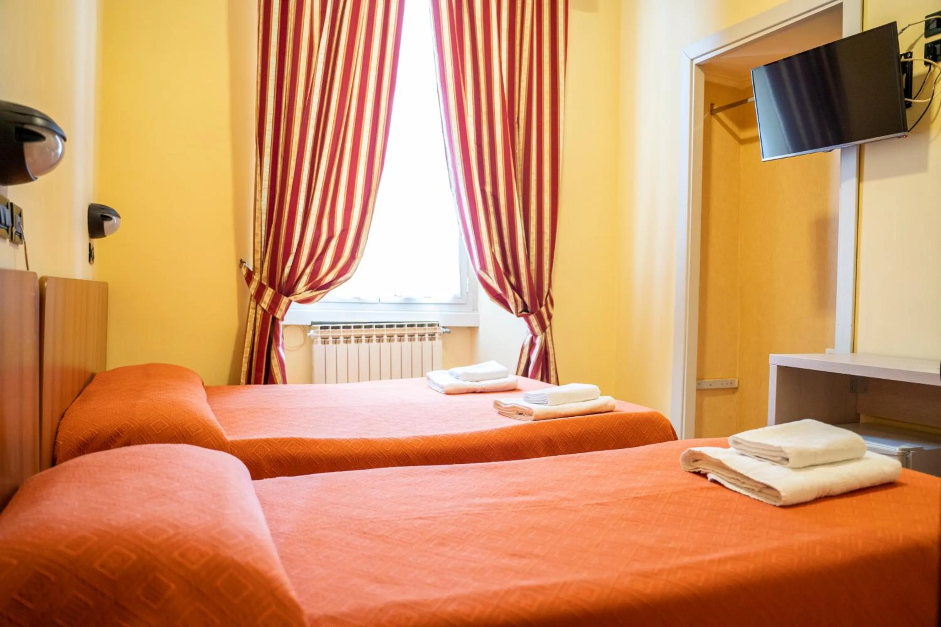 Bed in Hotel Ferrarese