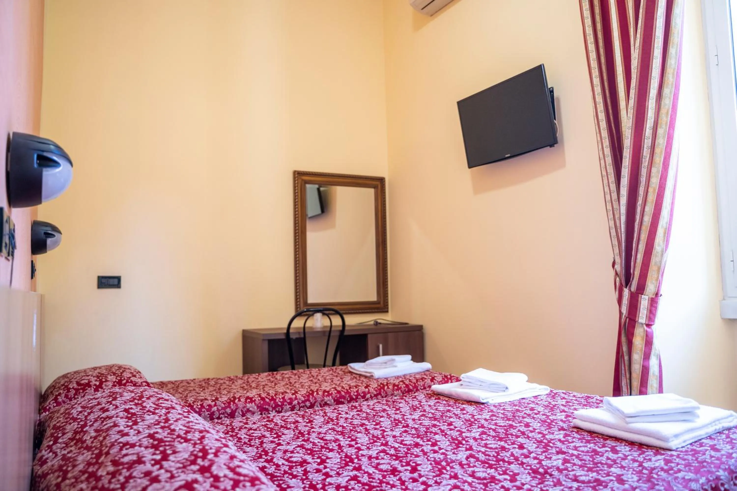 Bed in Hotel Ferrarese