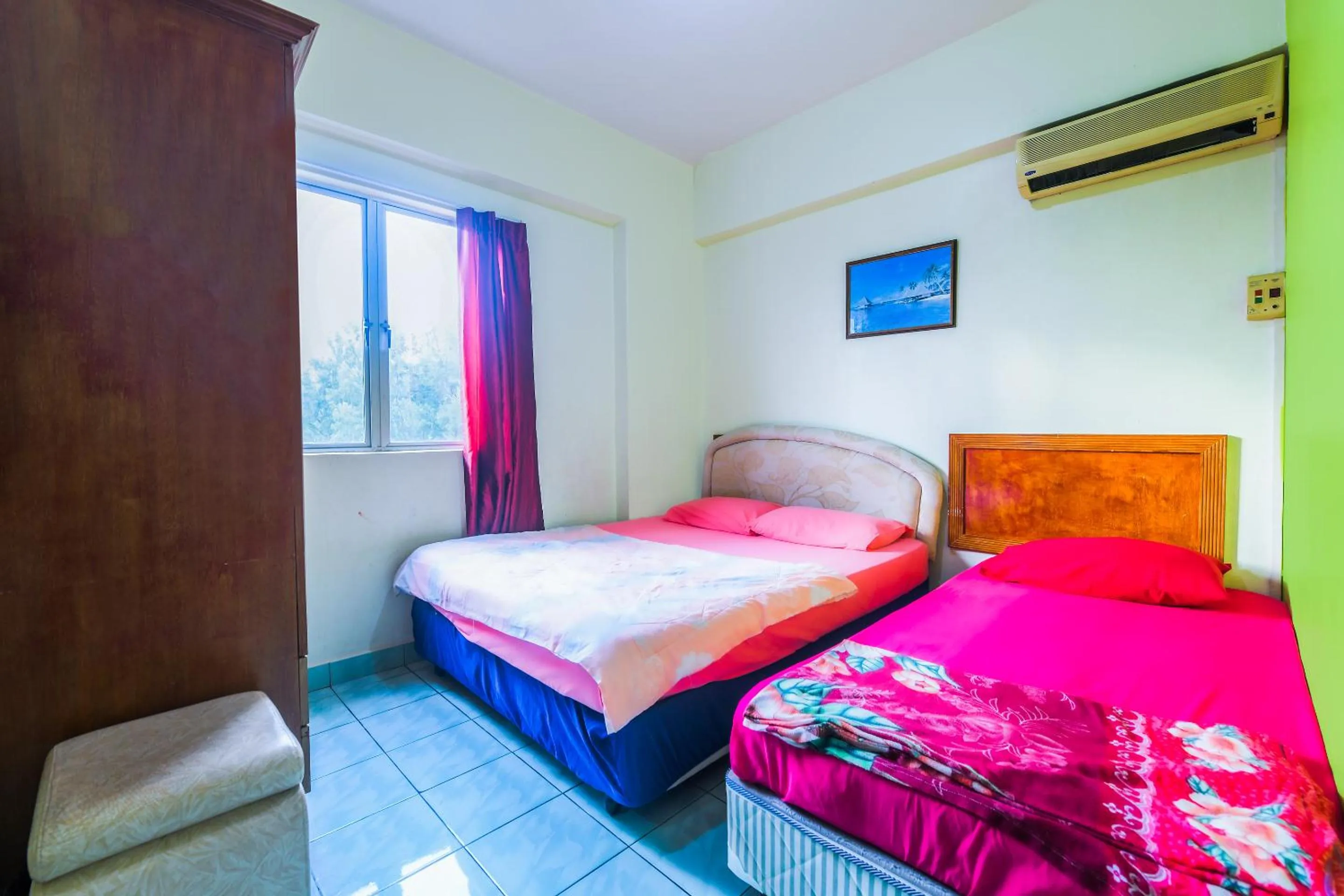 Bedroom in OYO Home 90466 JC Sunshine Bay Resort Apartment Port Dickson