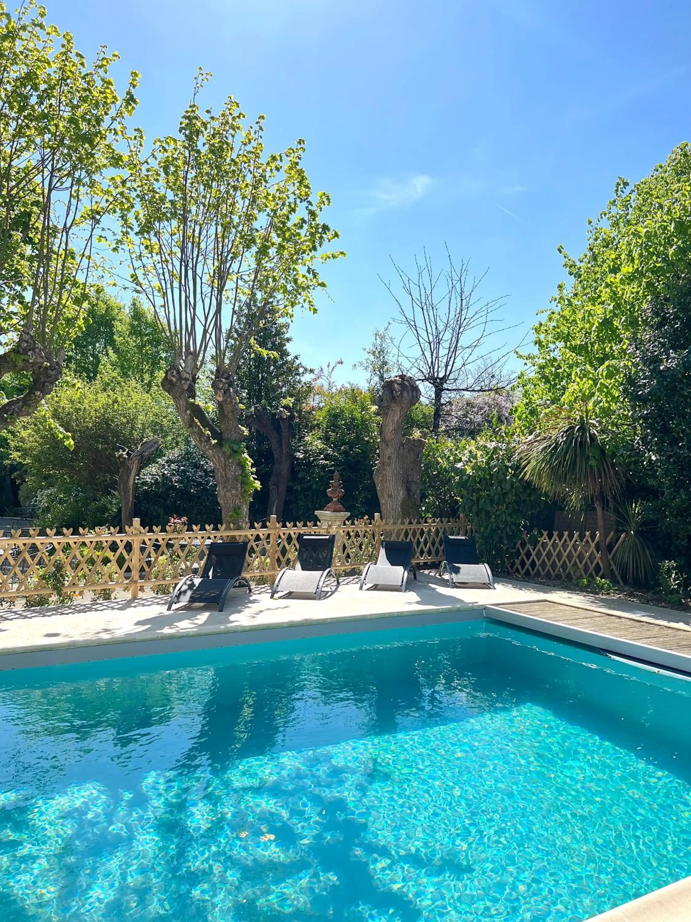 Swimming pool in Hôtel Le Petit Périer