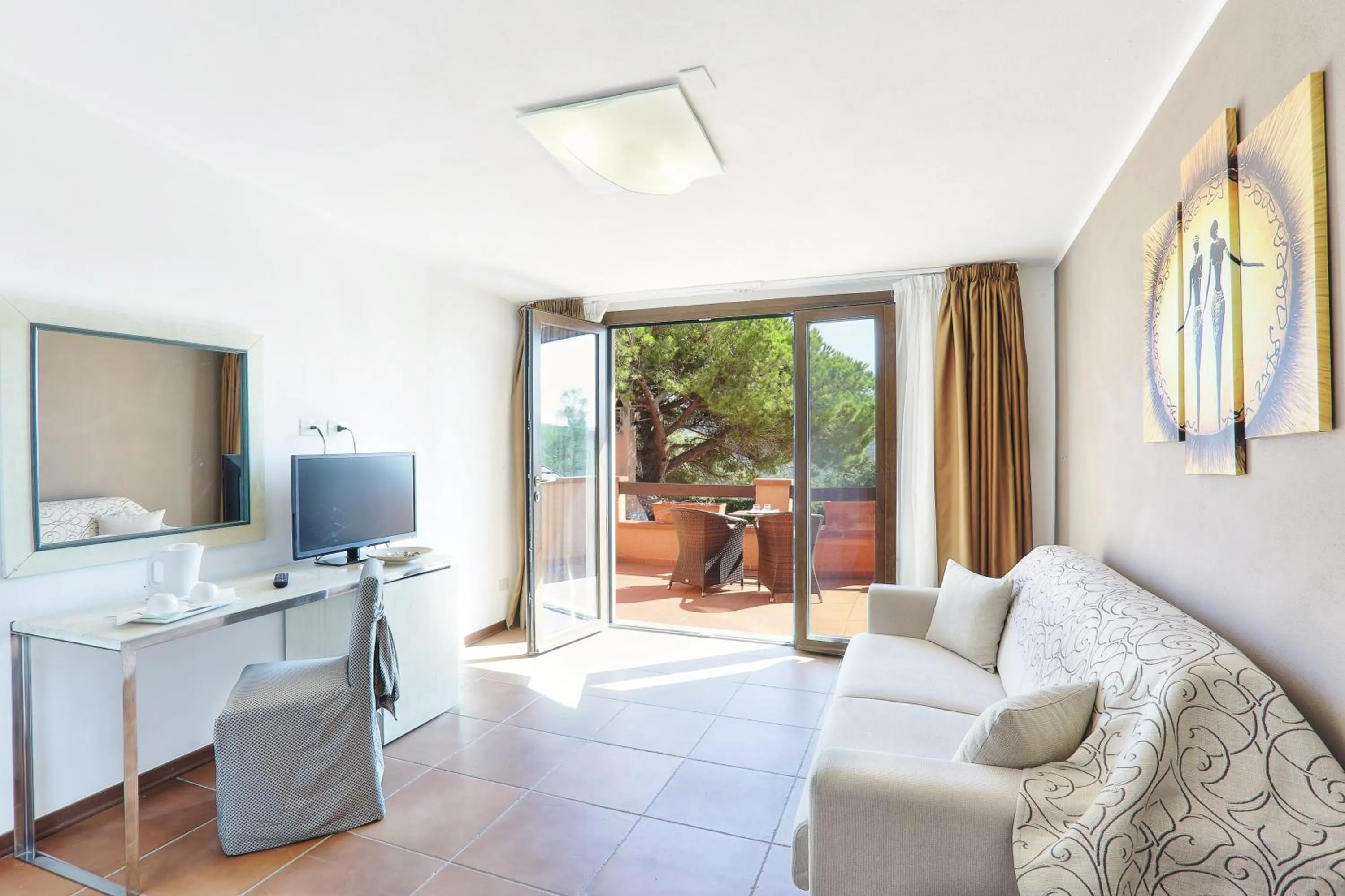 Communal lounge/ TV room in Resort Le Picchiaie