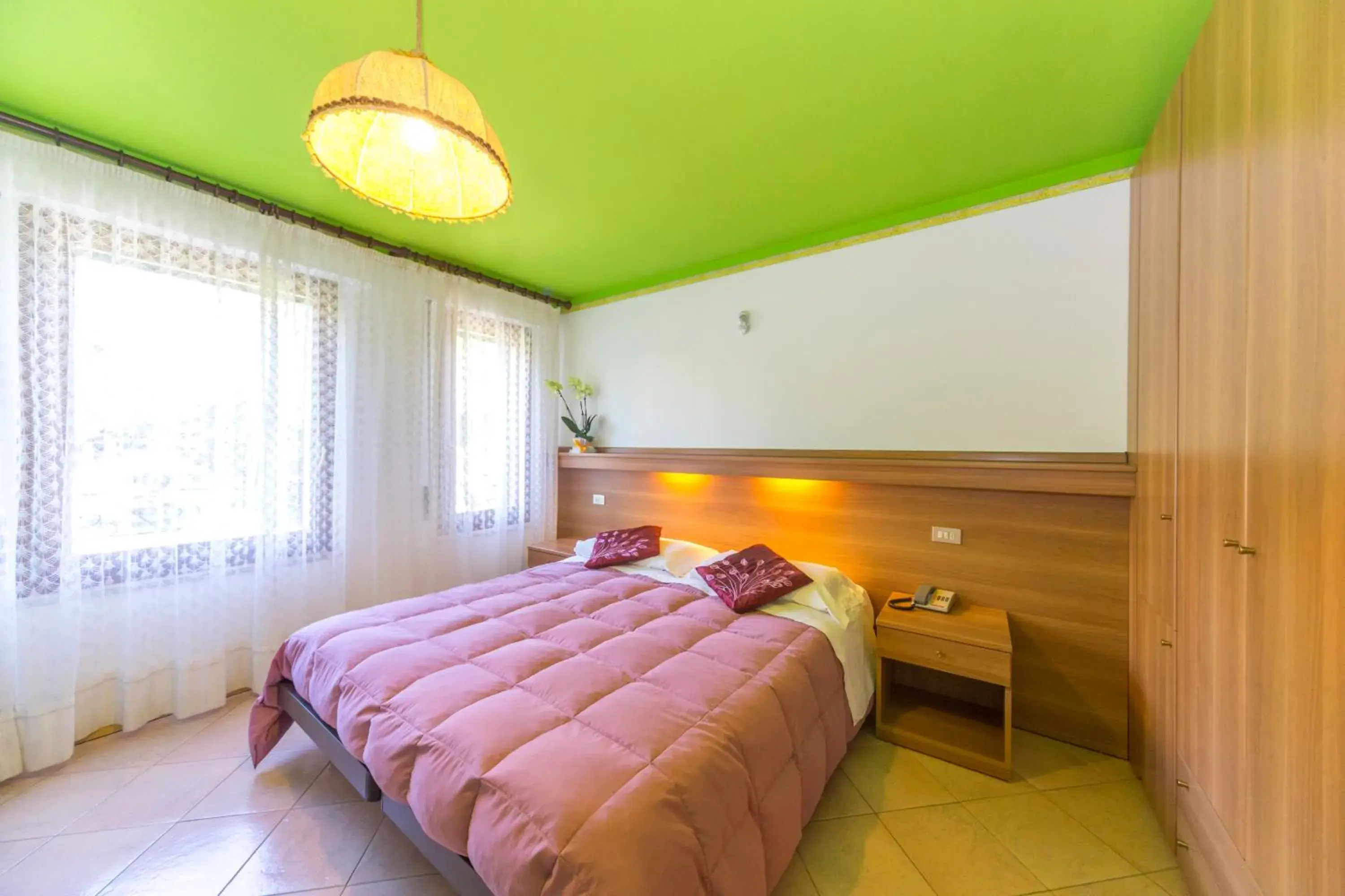 Classic Quadruple Room in Hotel Trentino Classic Quadruple Room in Hotel Trentino