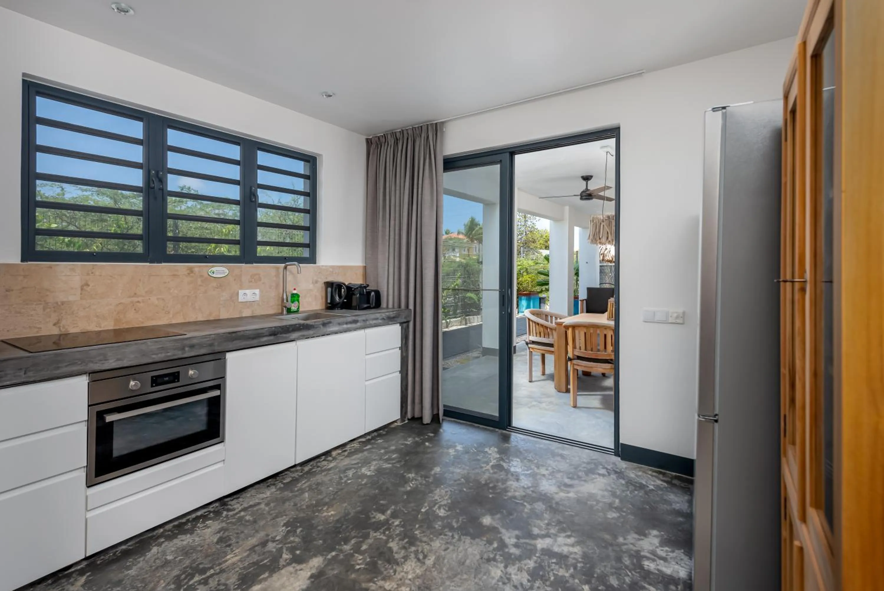 Kitchen or kitchenette in Bloozz resort Bonaire