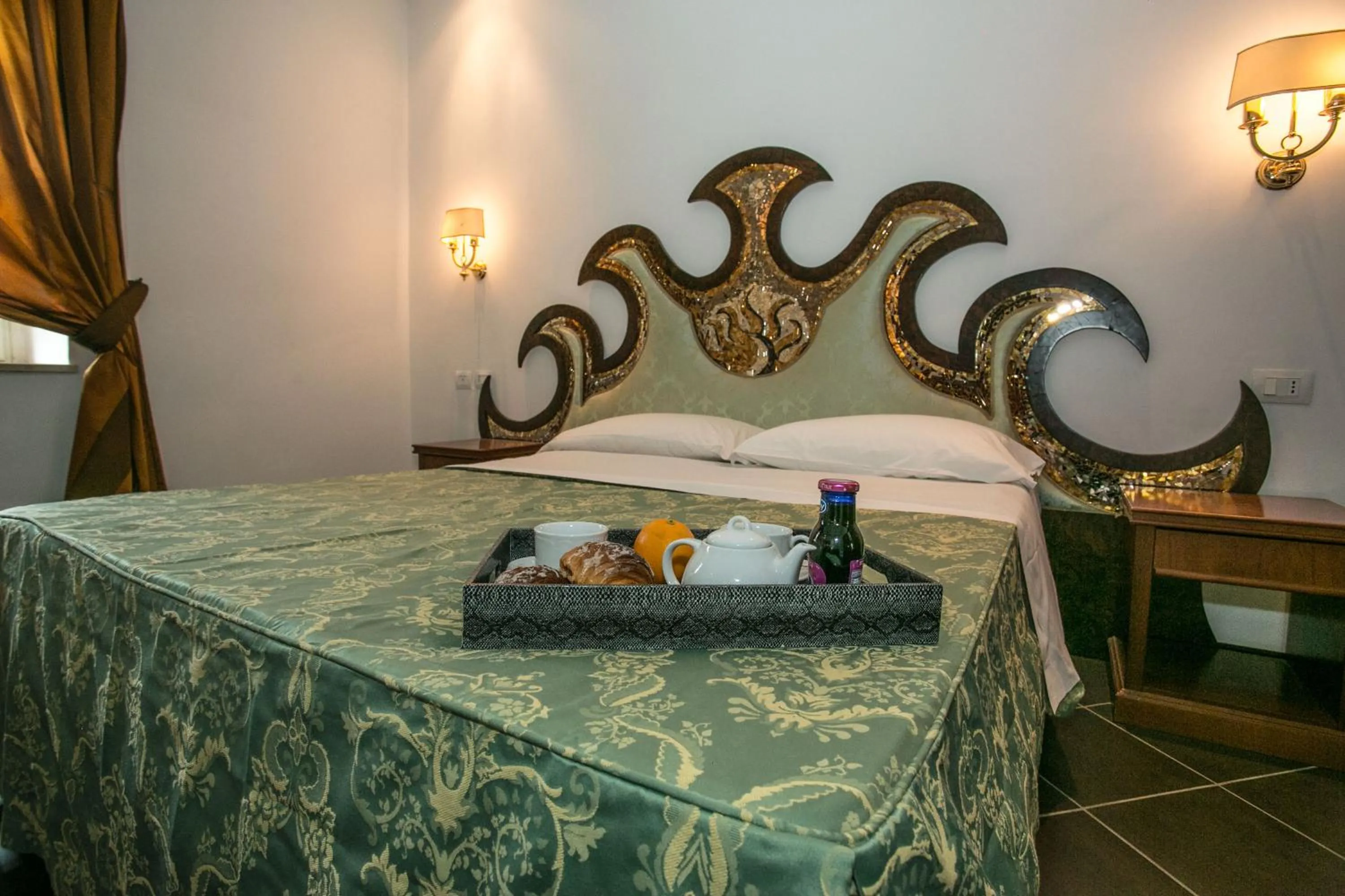 Bed in Hotel Quadrifoglio Roma Eur