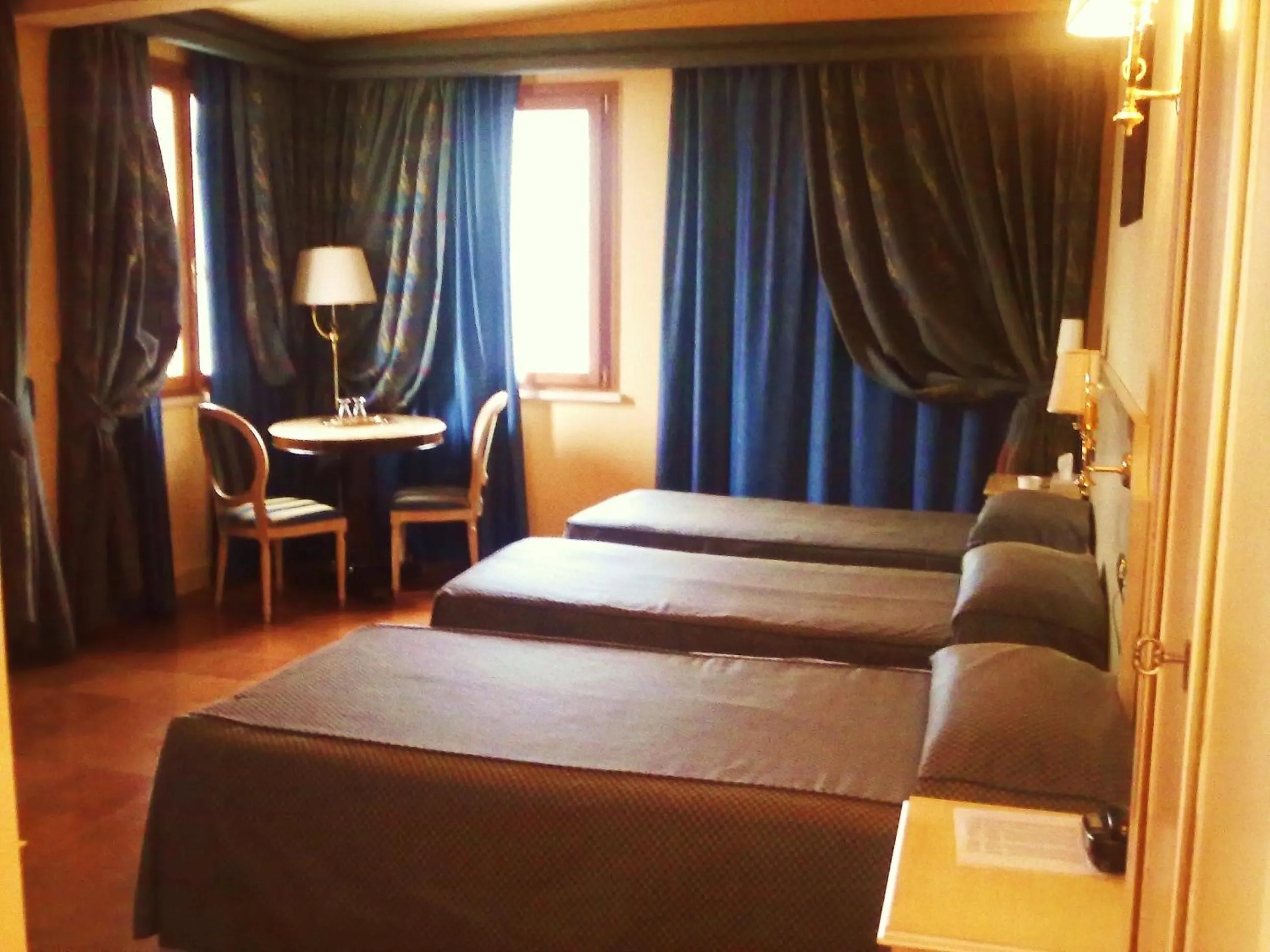 Photo of the whole room, Bed in Hotel Quadrifoglio Roma Eur