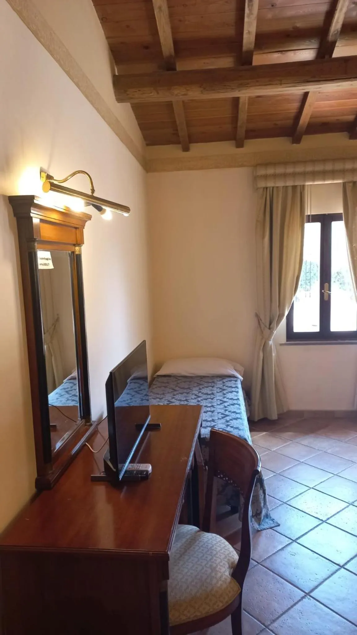 Bed in Hotel Quadrifoglio Roma Eur