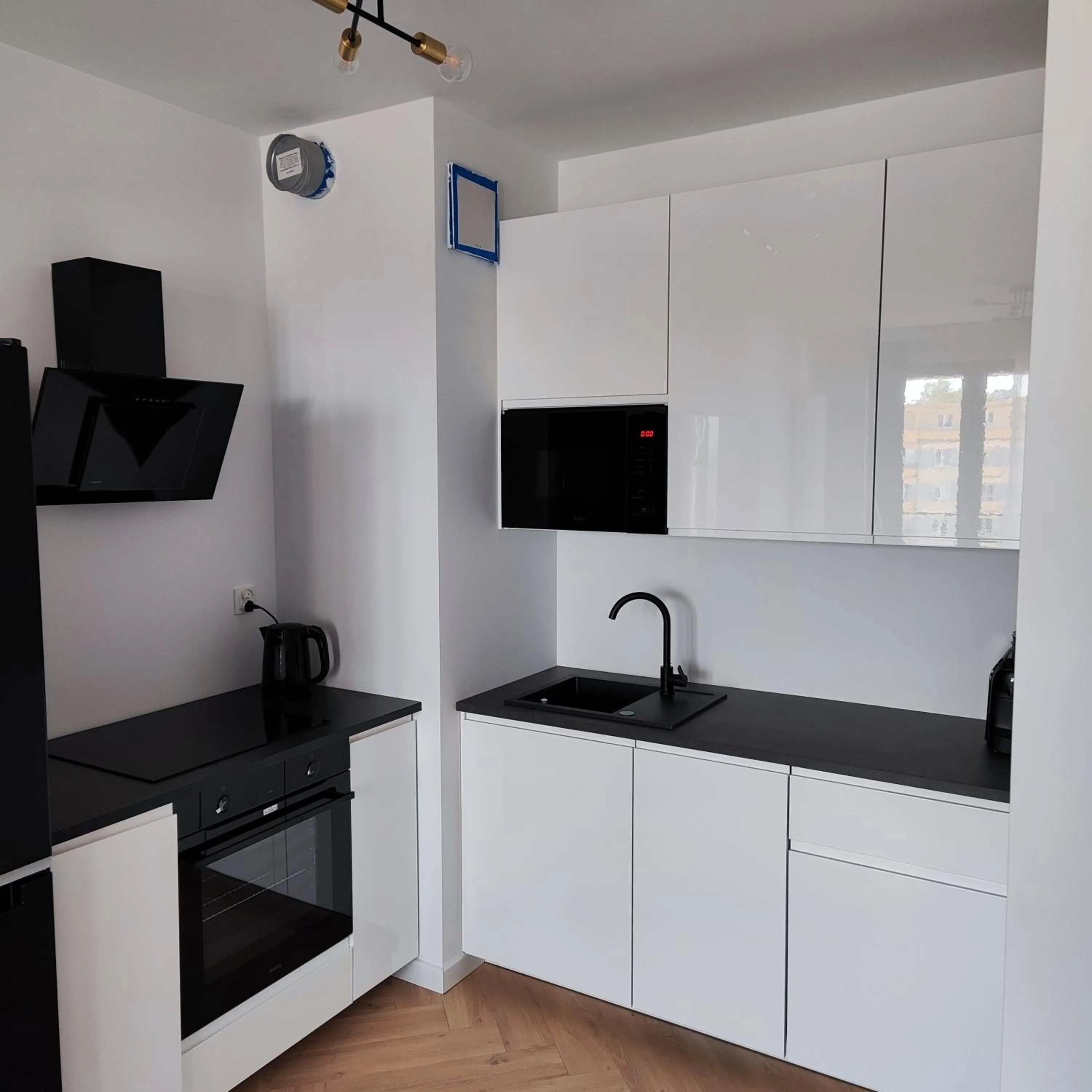 Kitchen or kitchenette in Sleepy3city Plac Unii