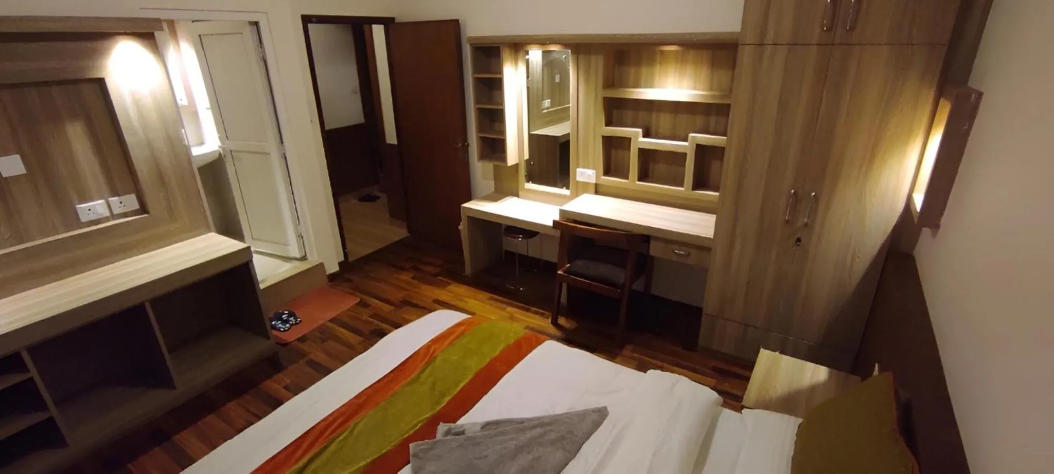 Bedroom, Bed in Raniban Suites - Apartment Home