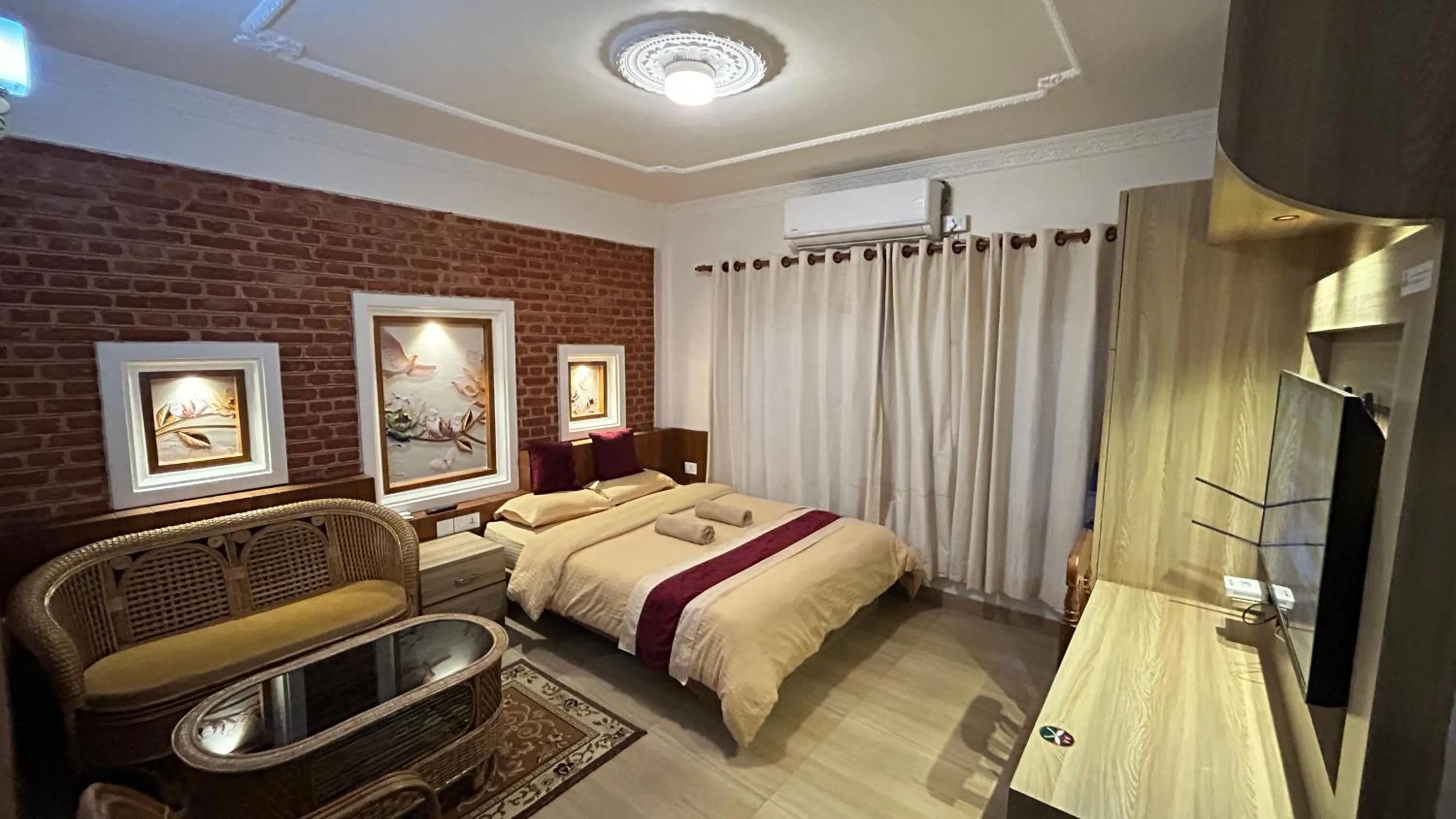 Bedroom, Bed in Raniban Suites - Apartment Home